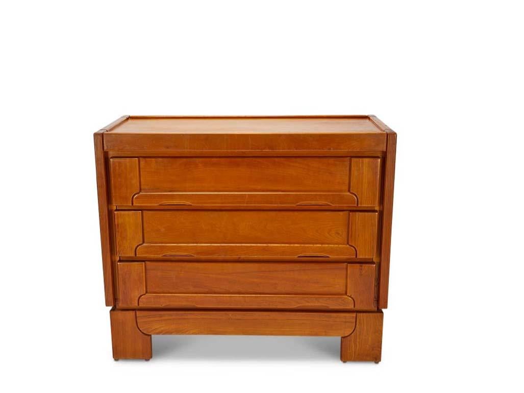 Maison Regain: Elm chest of drawers
France; circa 1950s.