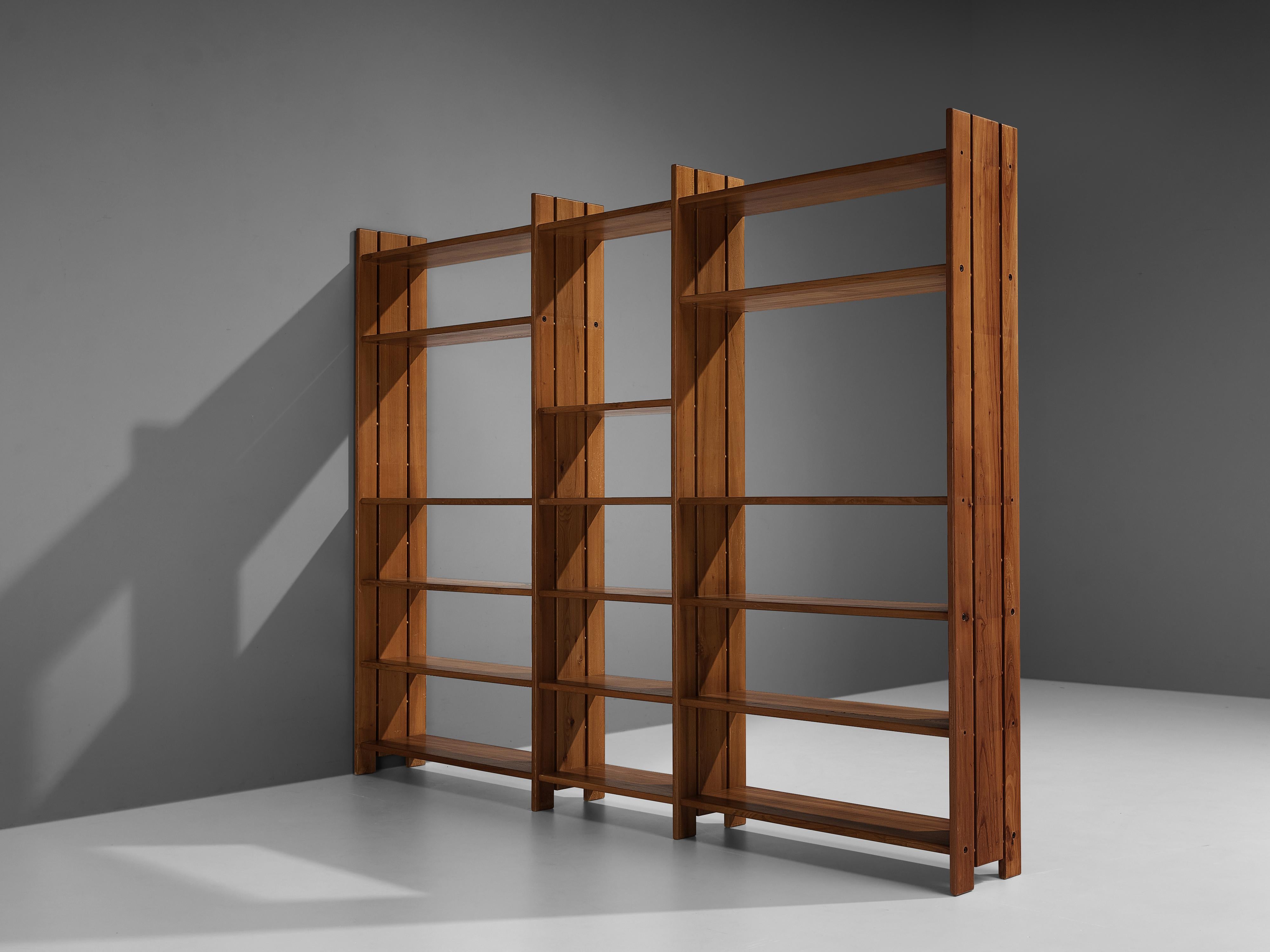 Maison Regain, bookshelf, solid elm, metal, France, 1970s

Free-standing bookshelf that can be placed facing a wall or used as a decorative room divider. In any case the design by Maison Regain features clean lines and allow you to showcase your
