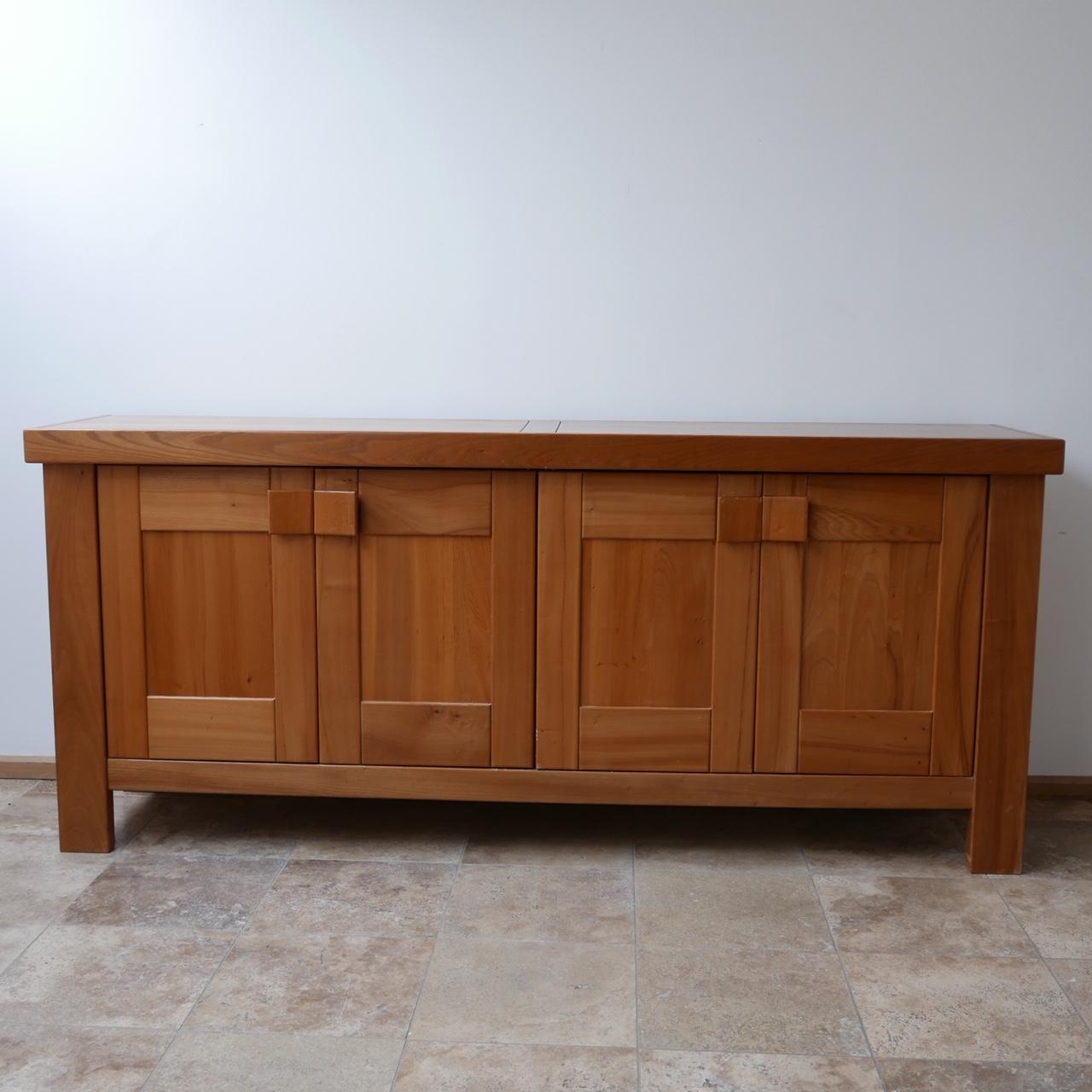 A scarce large credenza by French design company Maison Regain,

Formed from Elm, circa 1970s.

Maison Regain were the main competitive force to Pierre Chapo and designed many similar pieces in the circa 1970s in France.

Good quality