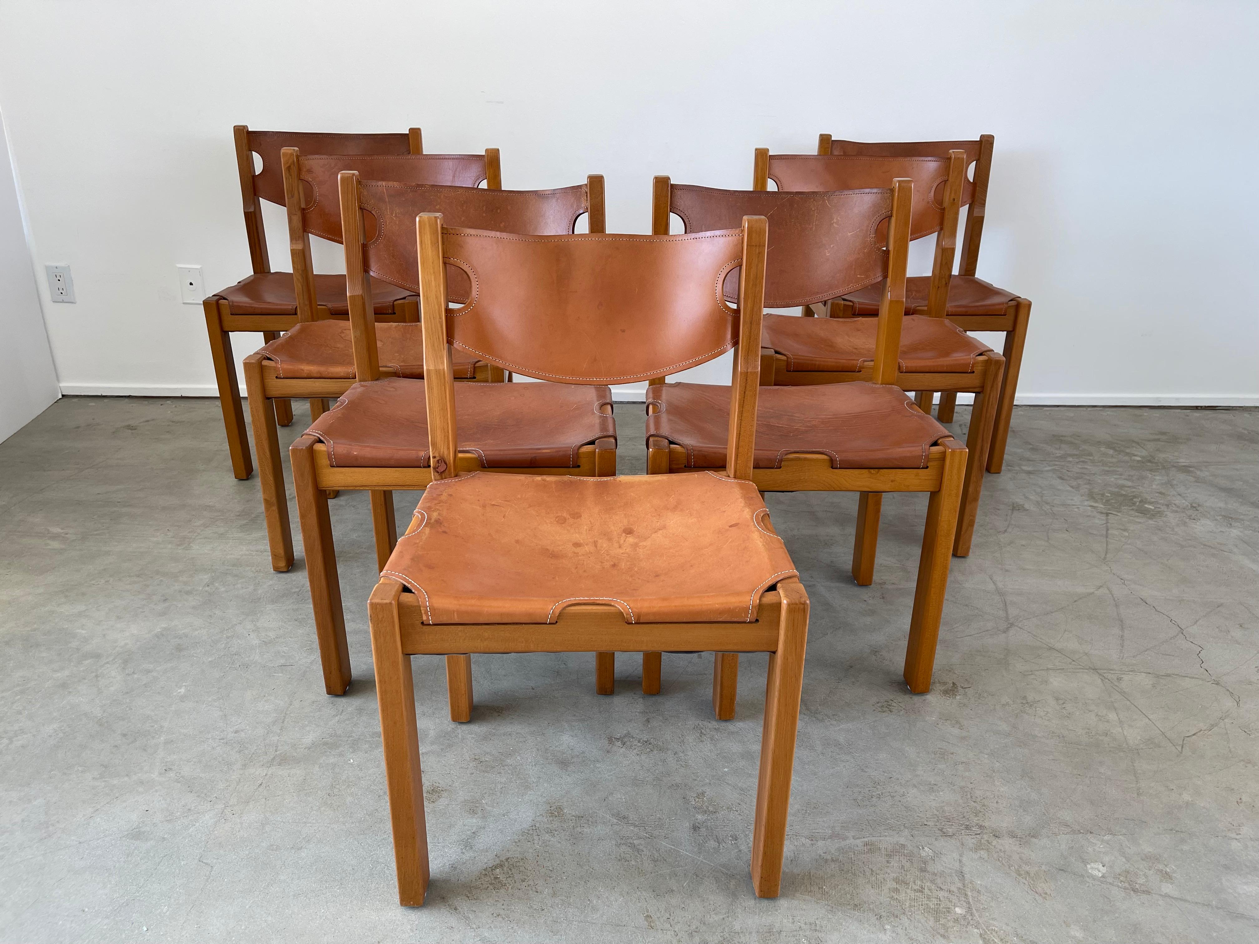 Maison Regain leather and elm wood chairs
Great patina to leather and construction 
Priced individually. 

