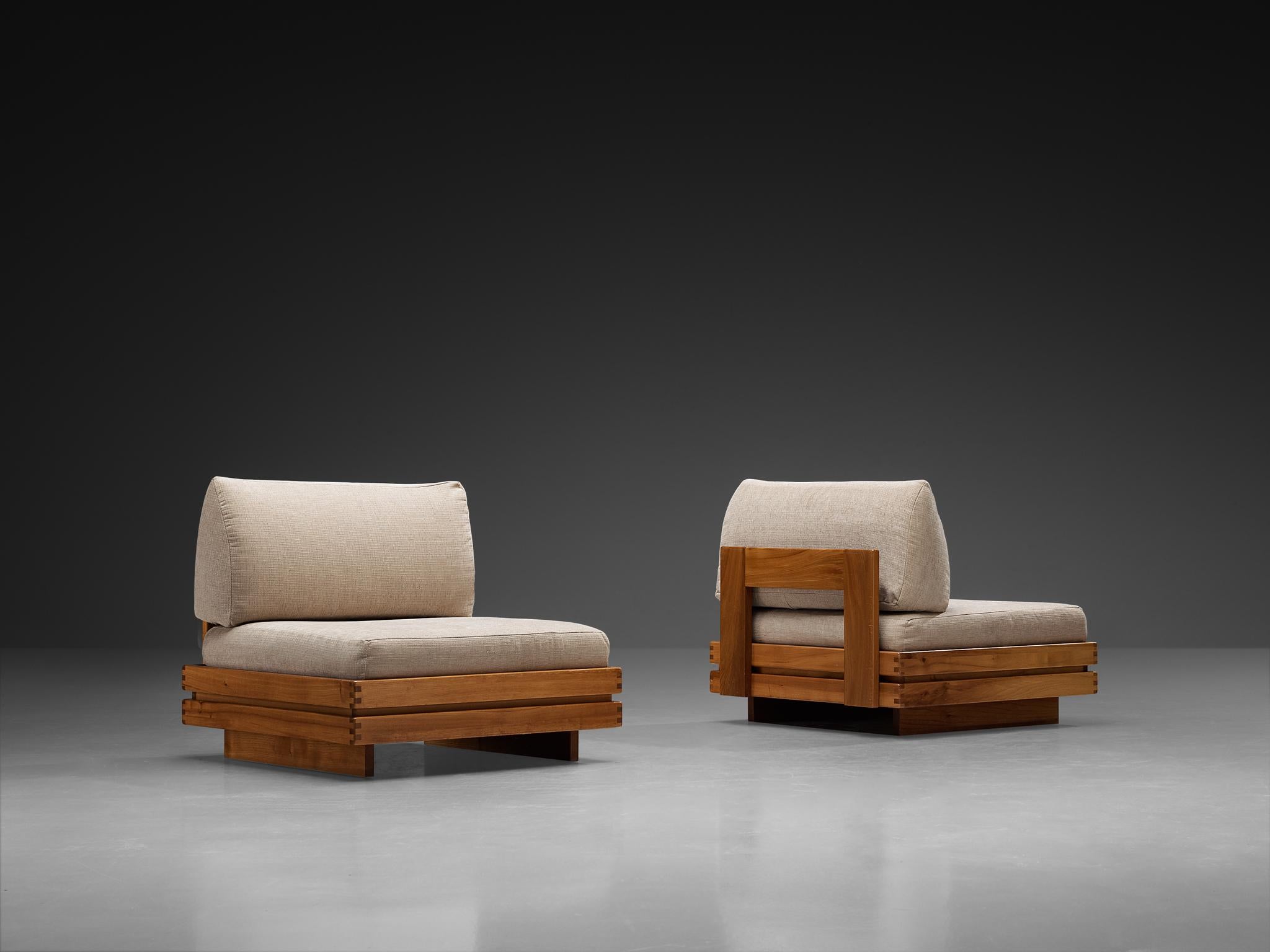 Maison Regain, pair of lounge chairs, elm, fabric, France, 1980s

Pure and beautiful set of lounge chairs by Maison Regain. These items were made in the 1980s, feature a blend of simplicity and richness in their appearance. Each chair shows a low