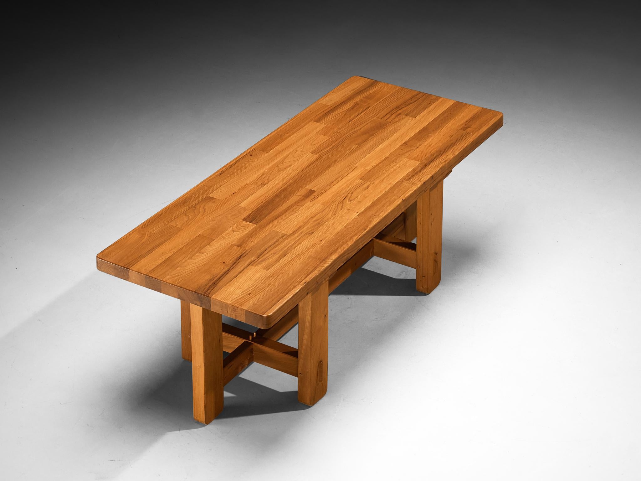 Maison Regain, dining room table, solid elm, France, 1970s

This exquisite rectangular-shaped dining table by Maison Regain is a stunning piece of furniture showing beautiful design and craftsmanship. The base, characterized by its clear lines and