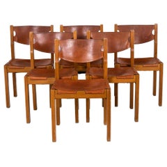 Maison Regain, Series of Six Chairs in Elm and Leather, 1960's