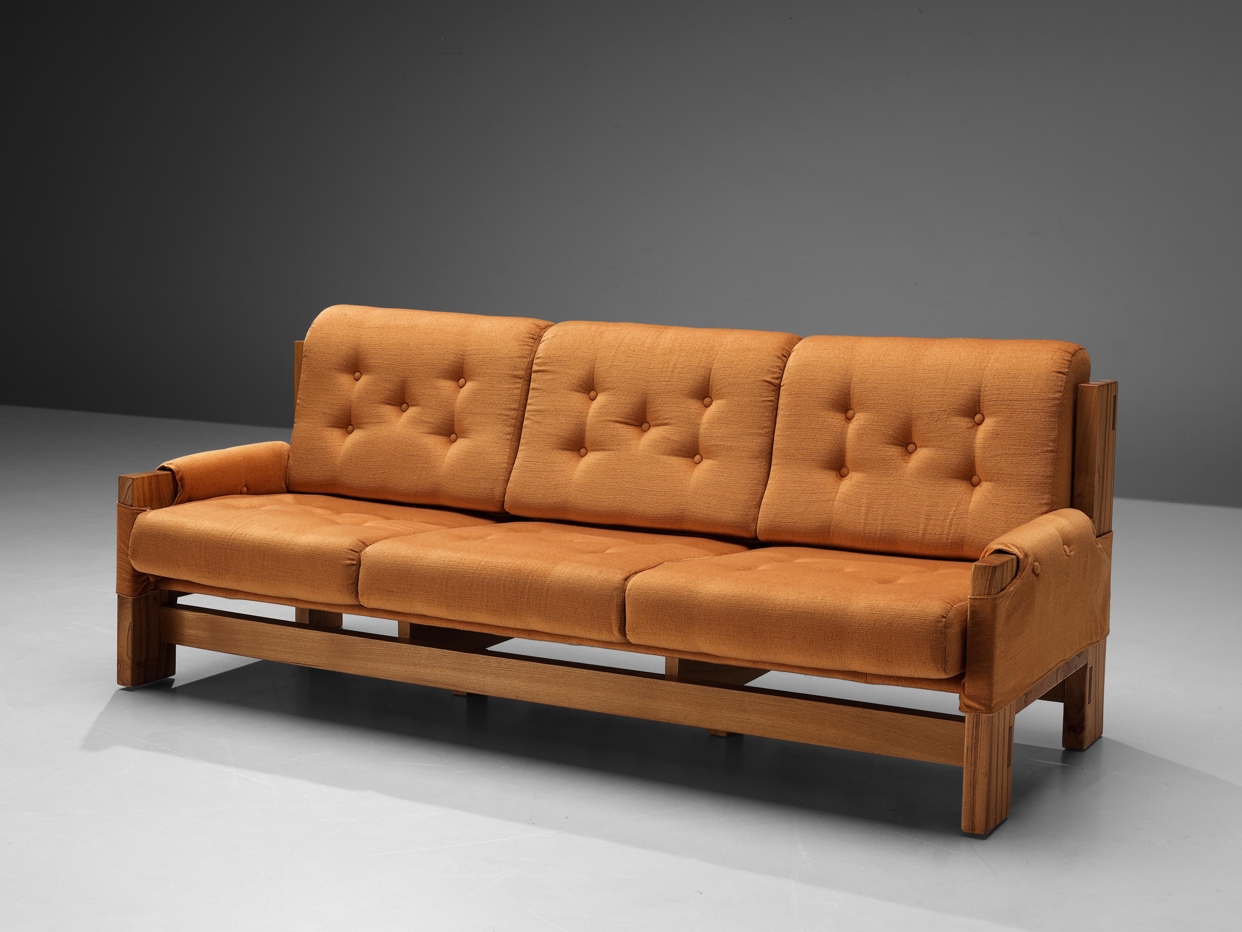 Maison Regain, sofa, elm, fabric, leather France, 1960s

This sofa by Maison Regain is an elegant and well-proportioned piece within a simplistic construction that allows it to fit seamlessly into any interior. The designer decided to stay modest