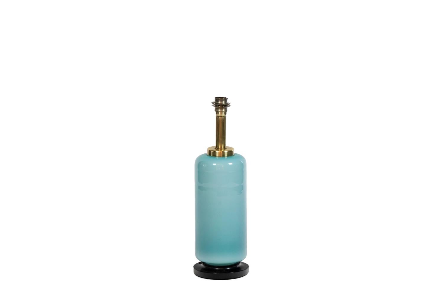 Maison Venini, attributed to. 

Bottle-shaped Murano glass lamp in celadon color.

Italian work realized in the 1960s.

New and functional electrical system.

!The price doesn’t include the lampshade price. However, our workshop can advise