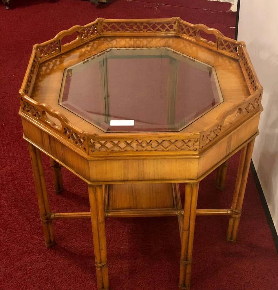 Maitland Smith Style Bamboo Form Octagonal End or Side Table with Bevelled Glass. Having an insert glass bevelled tabletop and pierced gallery border this walnut end or centre table is simply stunning. The base of faux bamboo form.