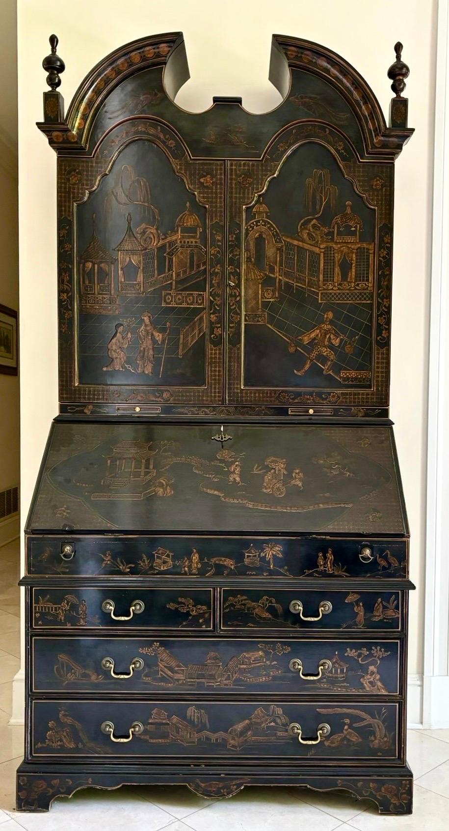 Maitland Smith 20th Century black lacquer two-piece secretary with coveted Hermes orange interior. This magnificent piece is a work of art. The lower cabinet features plenty of storage options with two pull out supports for the drop-down desk. The