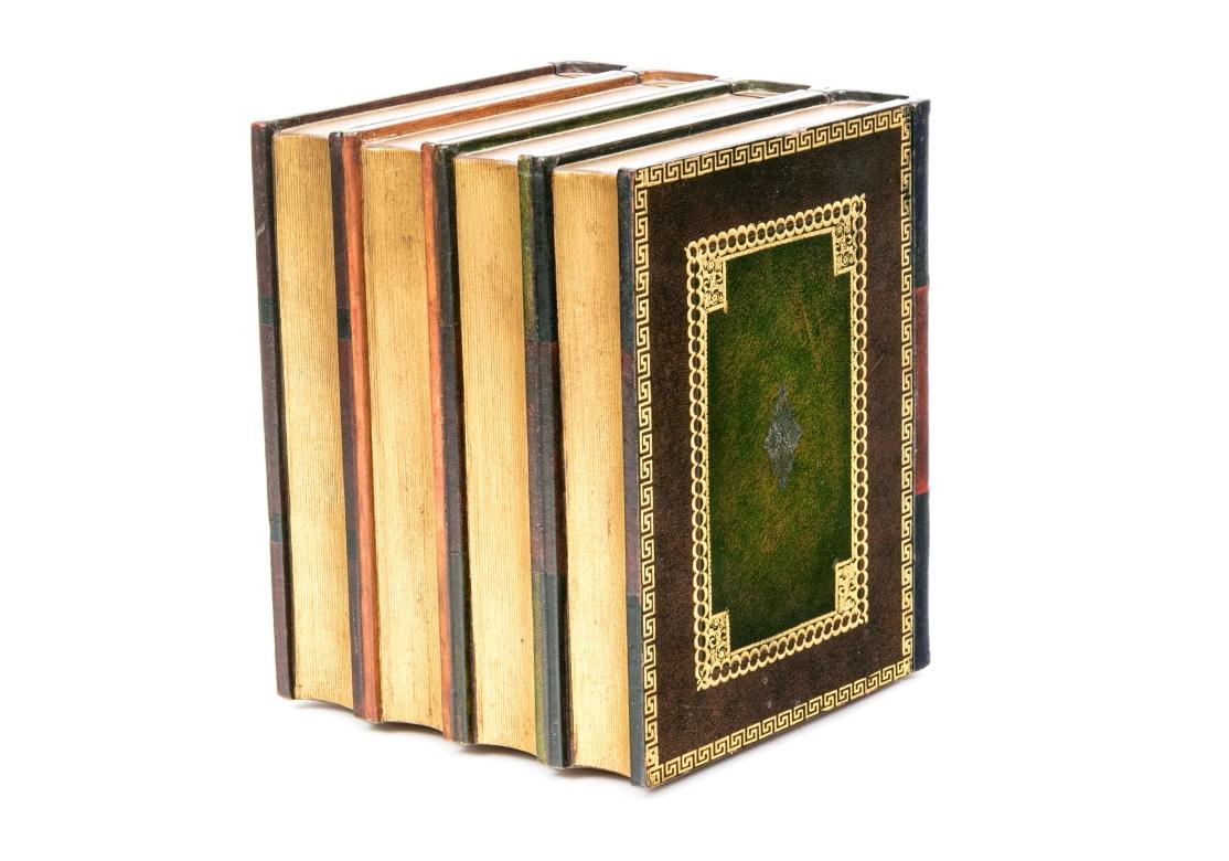 Maitland Smith book form storage with gilt embellishments and gilt margins. The group of four literary classics opens to two small over two full drawers with brass pulls.Label on verso. Magnetic closure.

Dimensions: 8