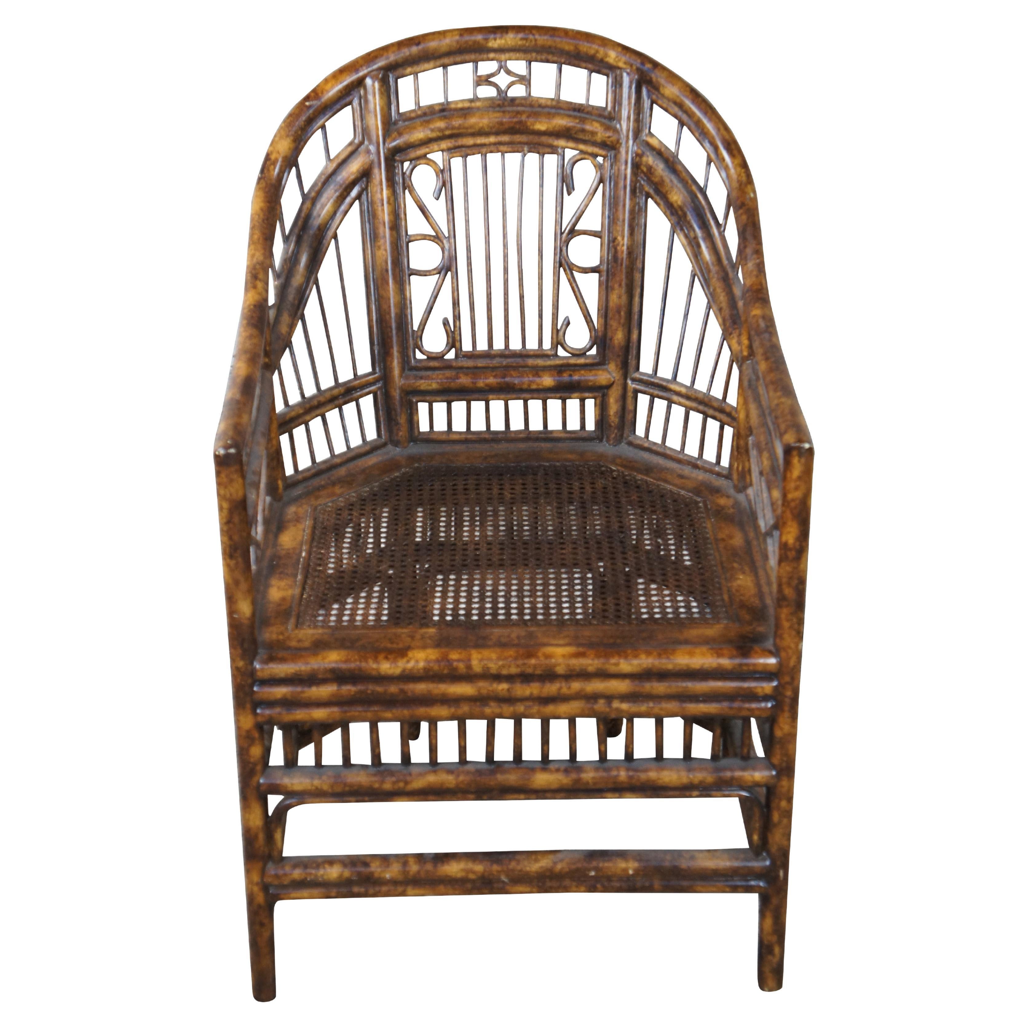 Late 20th century Maitland Smith Brighton Pavilion accent chair.  Made of bamboo and rattan featuring chinoiserie styling with bentwood horseshoe back, faux tortoiseshell finish and cained seat. 

Dimensions:
22.5