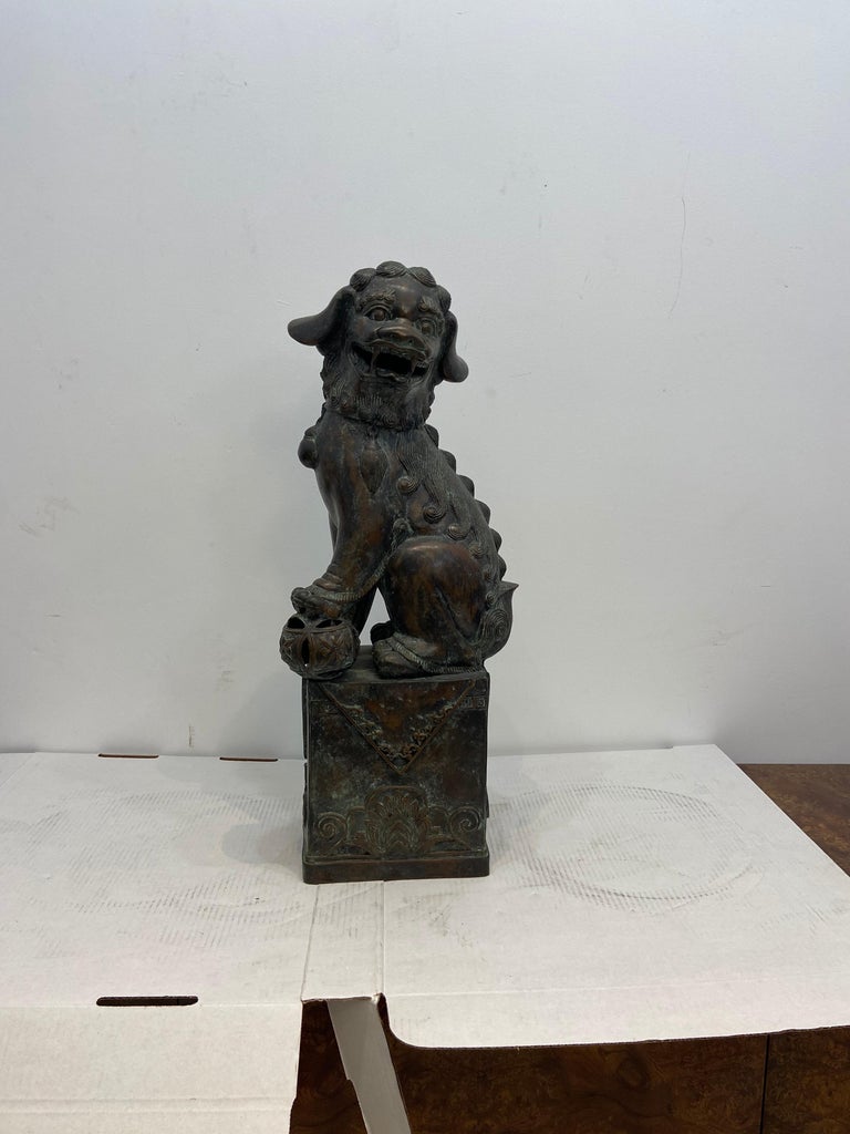 Maitland Smith. Very fine bronze of a foo dog. Exceptional quality and patina. 28” x 9” x 11”.