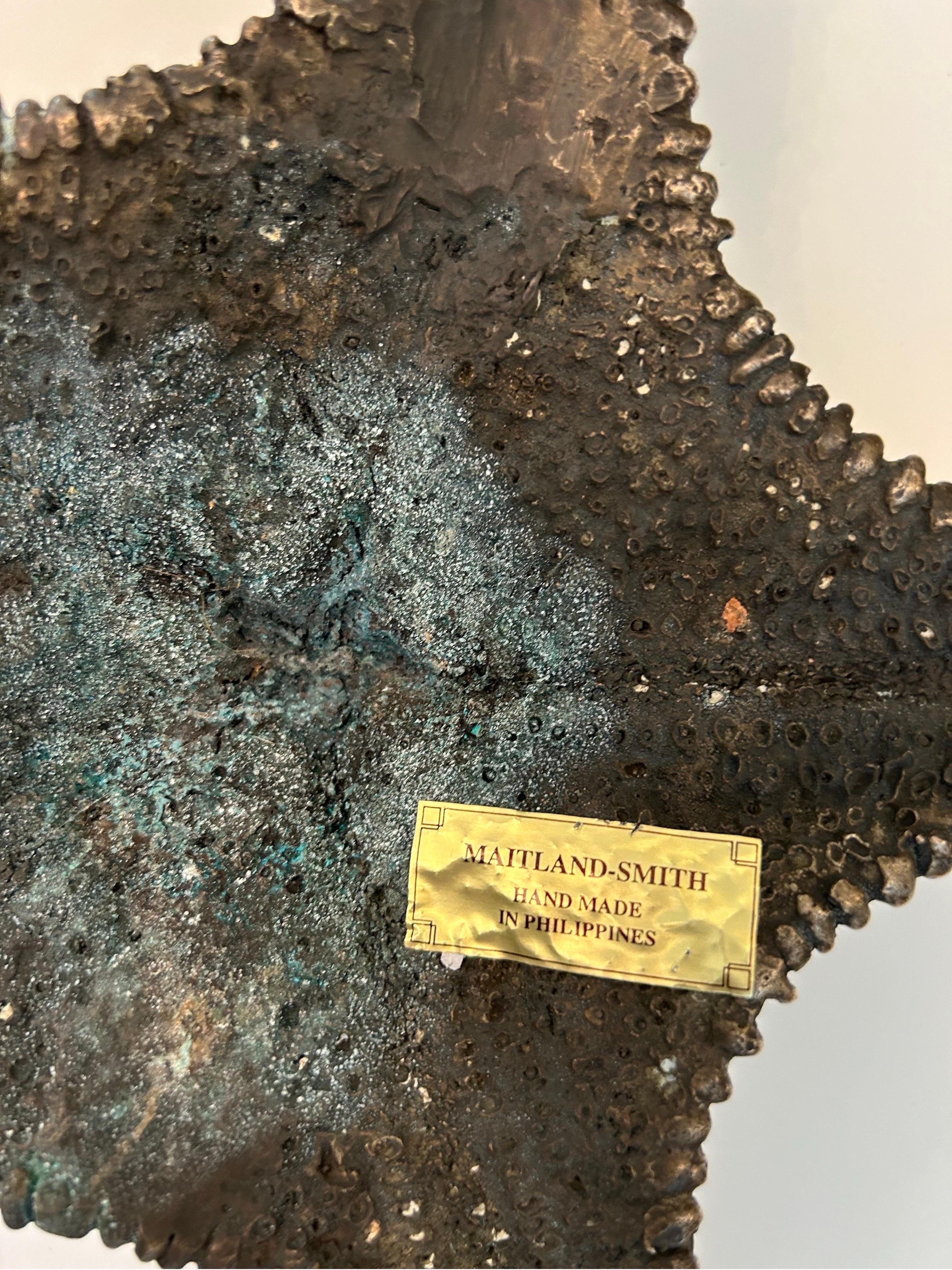 A very well cast silver bronze starfish by Maitland Smith with incredible detail and dimension… approximately 2 1/2 inches tall by 17 inches in diameter