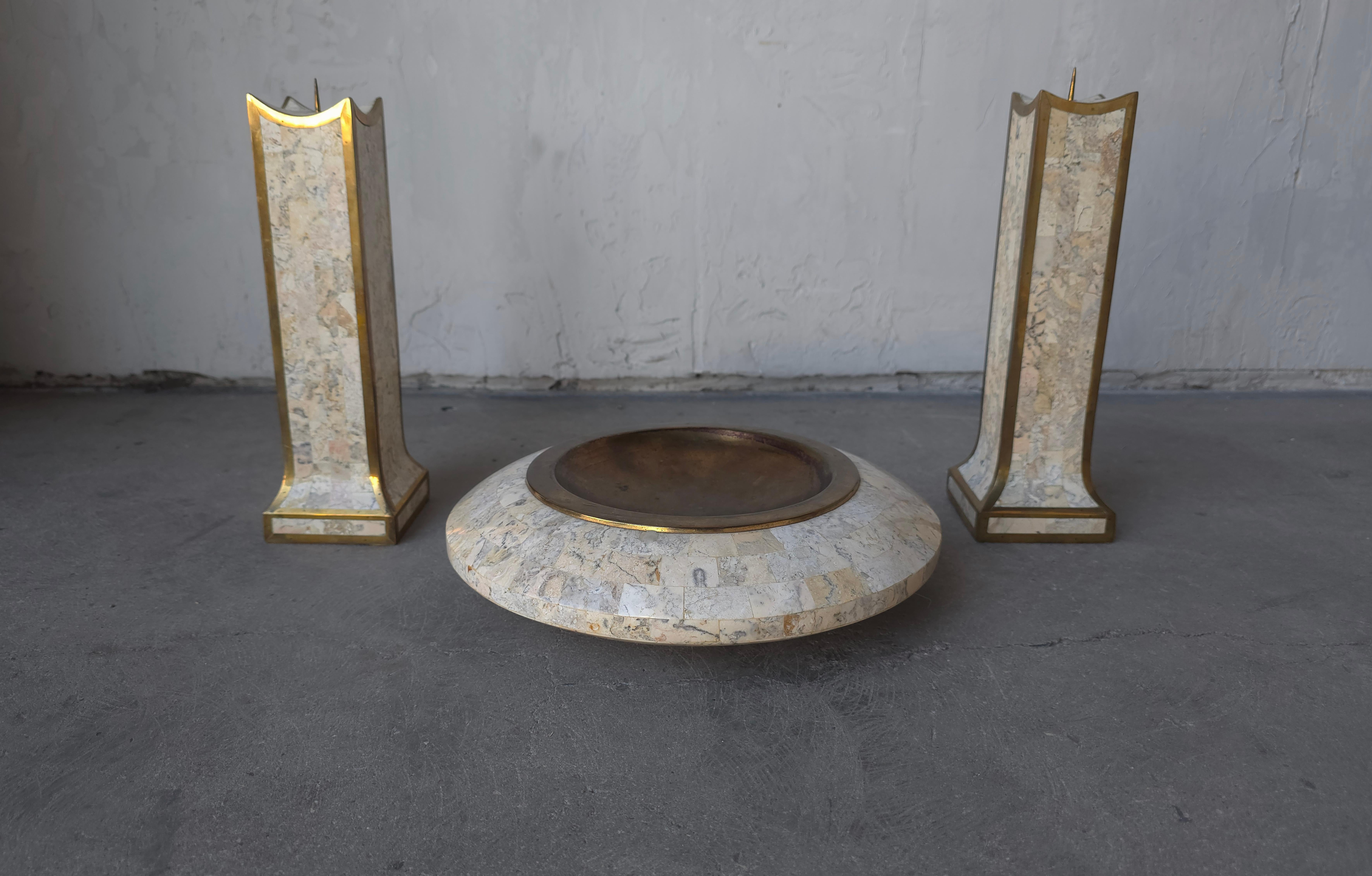 Nice coordinating set of tessellated marble and brass candle holders and catch-all bowl, manufactured by Maitland Smith.

The set in its entirety is in excellent condition, the brass is beautifully patinated.

Dimensions:
Candle holders: 10