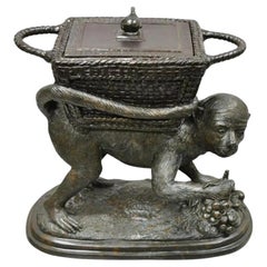 Sculpture de singe Maitland Smith en bronze coulé avec panier à couvercle et pot de jardinière