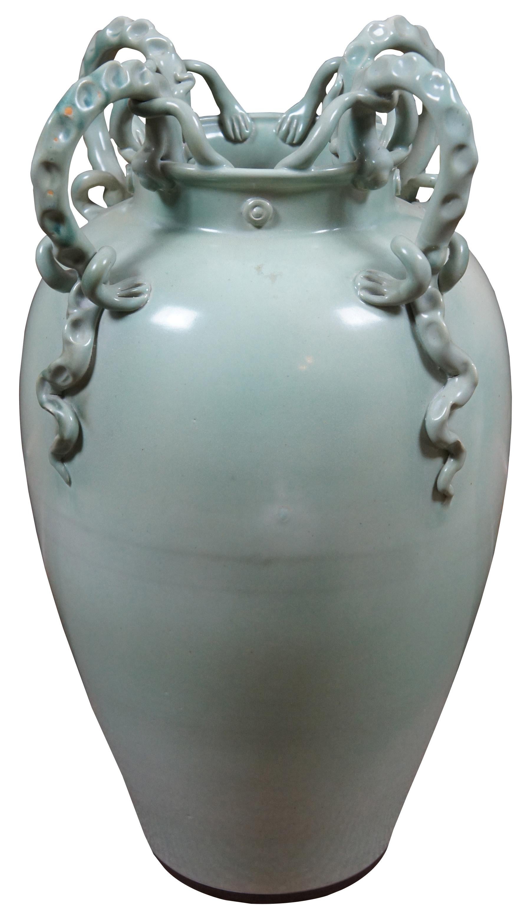 Vintage handmade Maitland-Smith floor vase or urn in celadon green with four lizard handles; signed on base.
 