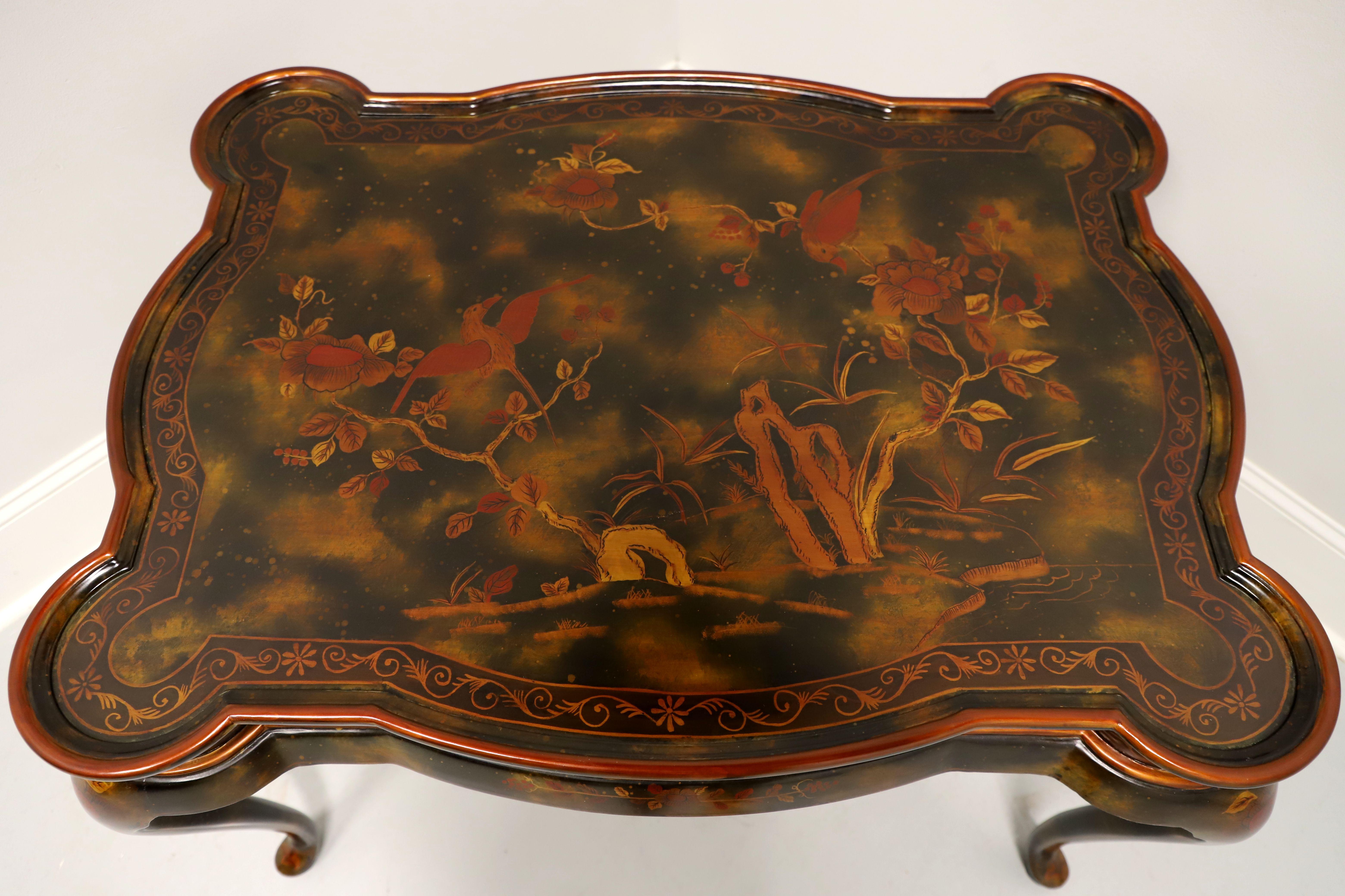 An Asian Chinoiserie style cocktail table by Maitland Smith. Solid hardwood, unique curvature design, hand painted throughout with Chinoiserie scenes in shades of black, red & gold, low gallery edge to top, rounded flair to apron, cabriole legs, and