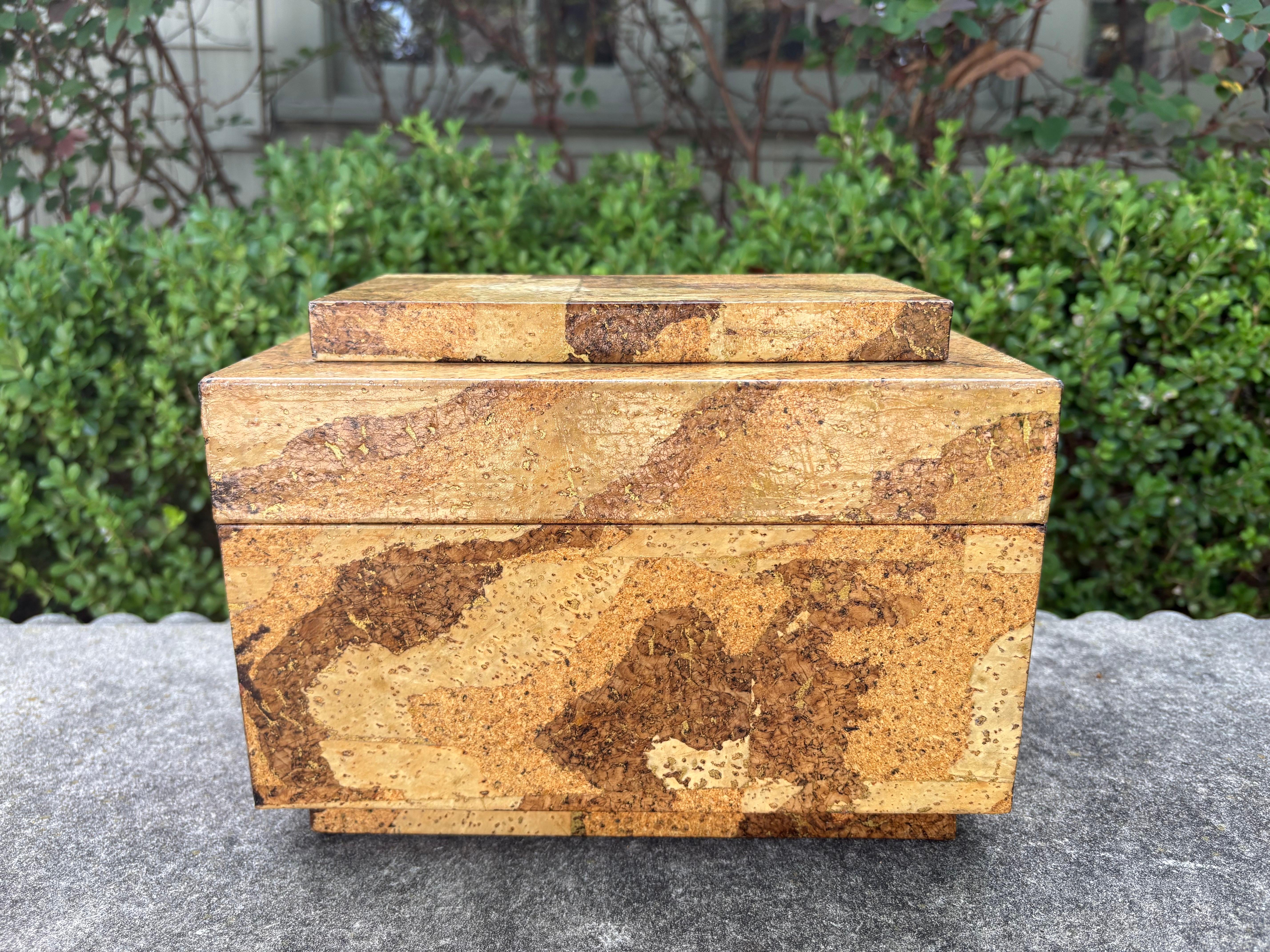 Maitland Smith Decorative Box.
Offered is a handsome cork box by Maitland Smith. This good sized well made box if felt lined makes a great table or bookcase accessory.  A great spot for storing remotes, cards, coasters or anything you want to keep