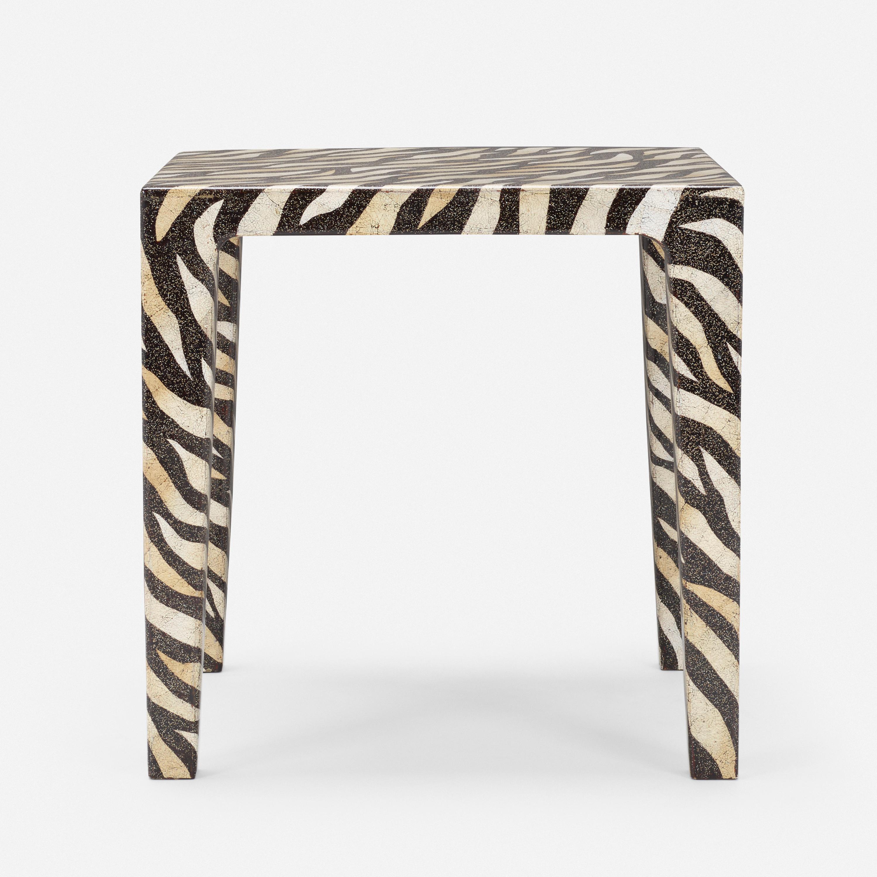 Hand-crafted occasional table with dramatic black and white patterning: eggshell Lacquer over wood.

About Maitland-Smith
Maitland-Smith is well-known for many hand-crafted specialties drawing inspiration from great works from the 18th, 19th,