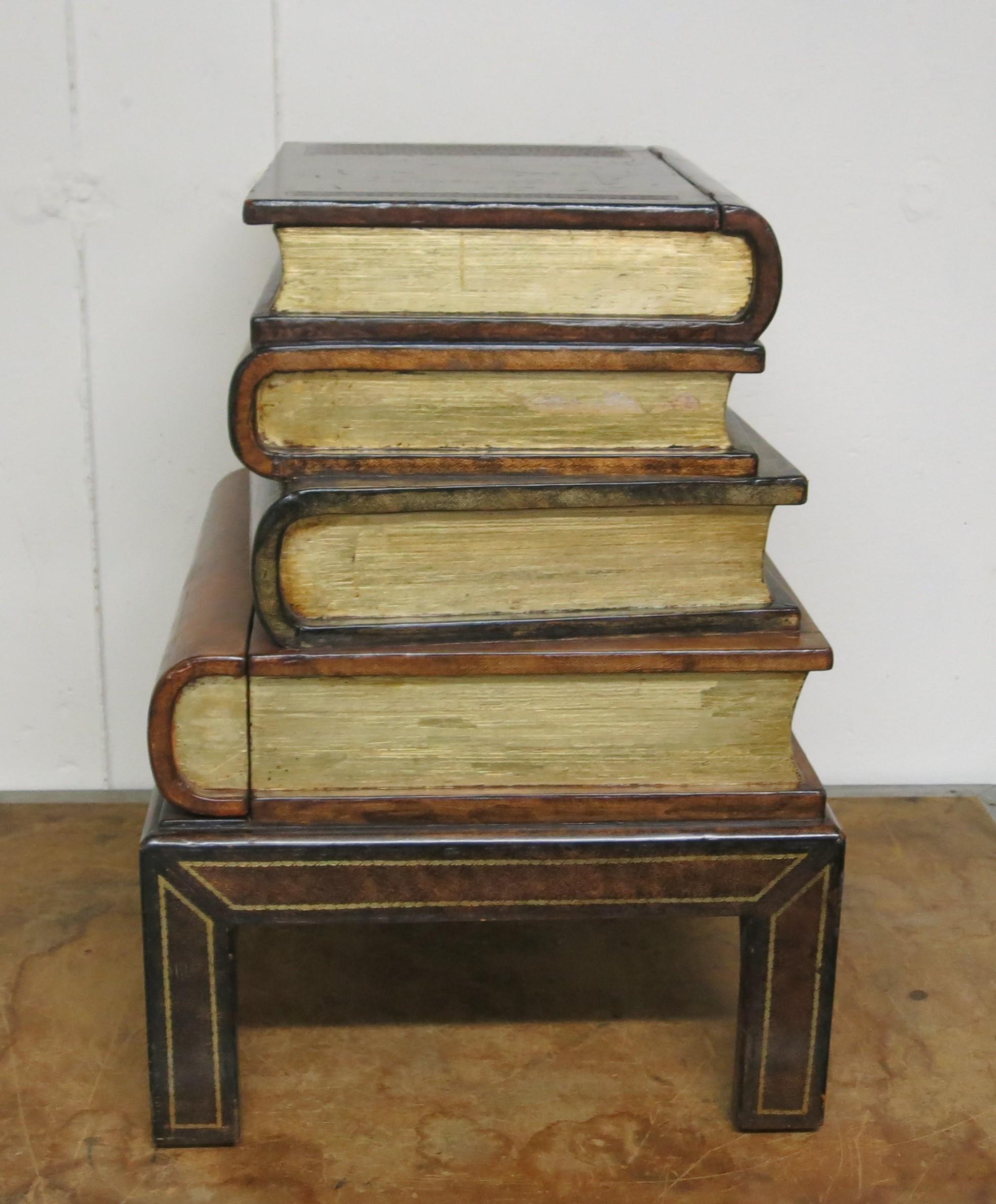 Great looking faux book end table by Maitland-Smith. One drawer and top that opens. It is 17