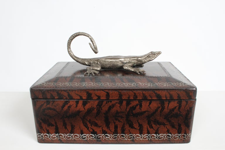 Vintage Maitland-Smith faux skin leather embossed wrapped box with metal silver tone lizard top and paper lined interior. In fine condition, only a few little flea bites size losses to leather. Suede lined bottom retails label.