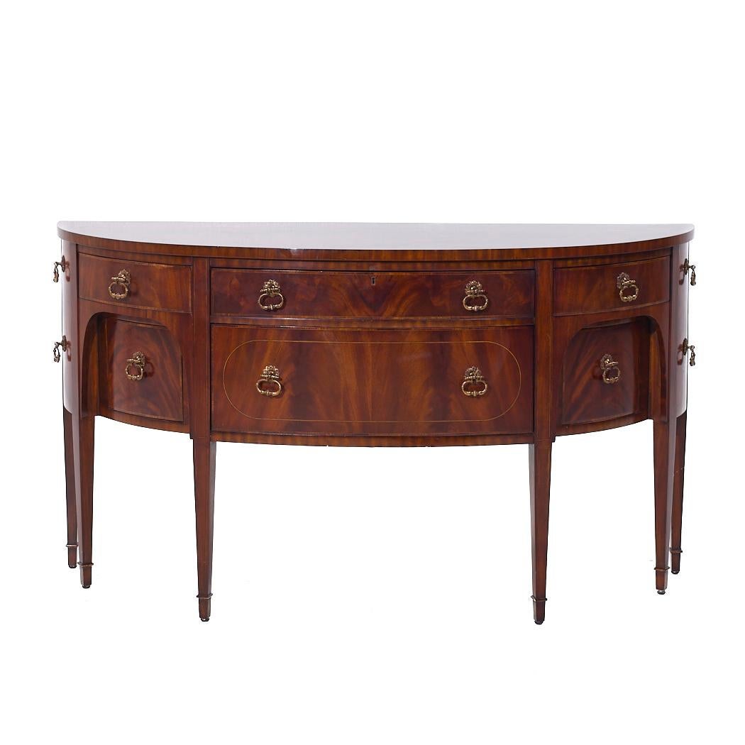 Maitland Smith Flame Mahogany Curved Front Sideboard Credenza Buffet Server

This sideboard measures: 64 wide x 22 deep x 35.5 inches high

We take our photos in a controlled lighting studio to show as much detail as possible. We do not Photoshop