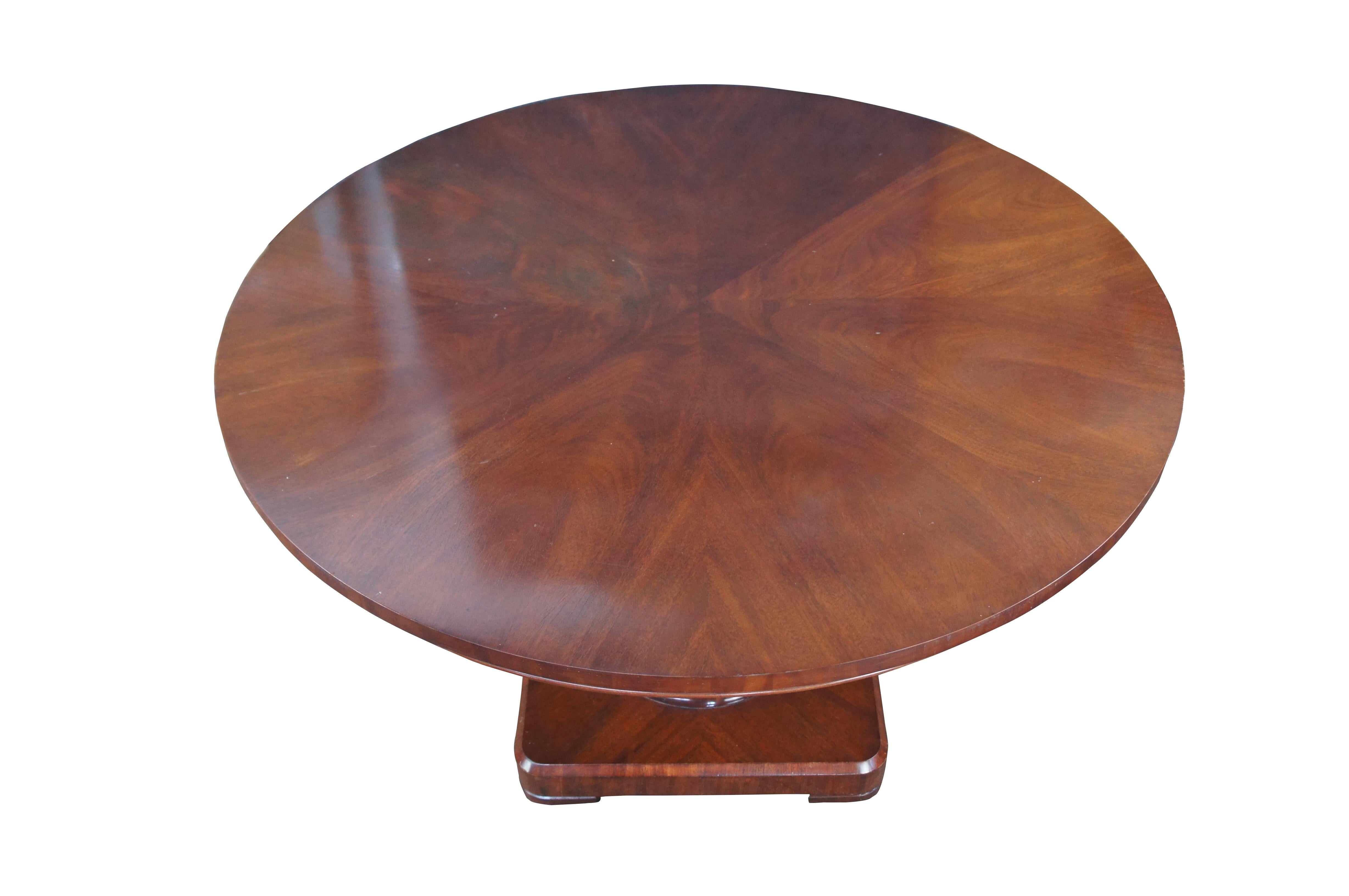 Ralph Lauren’s Mayfair collection is inspired by the elegance of Mediterranean design with a hint of Old Hollywood glamour. Impeccably crafted from solid mahogany wood with a rich swirled grain, the center table is set upon a plinth base with a
