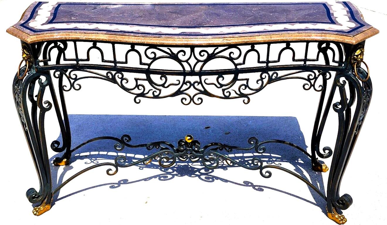 For FULL item description click on CONTINUE READING at the bottom of this page.

Offering One Of Our Recent Palm Beach Estate Fine Furniture Acquisitions Of A
Vintage MAITLAND SMITH French Console Table
Featuring a Brushed Iron Scroll Base Adorned