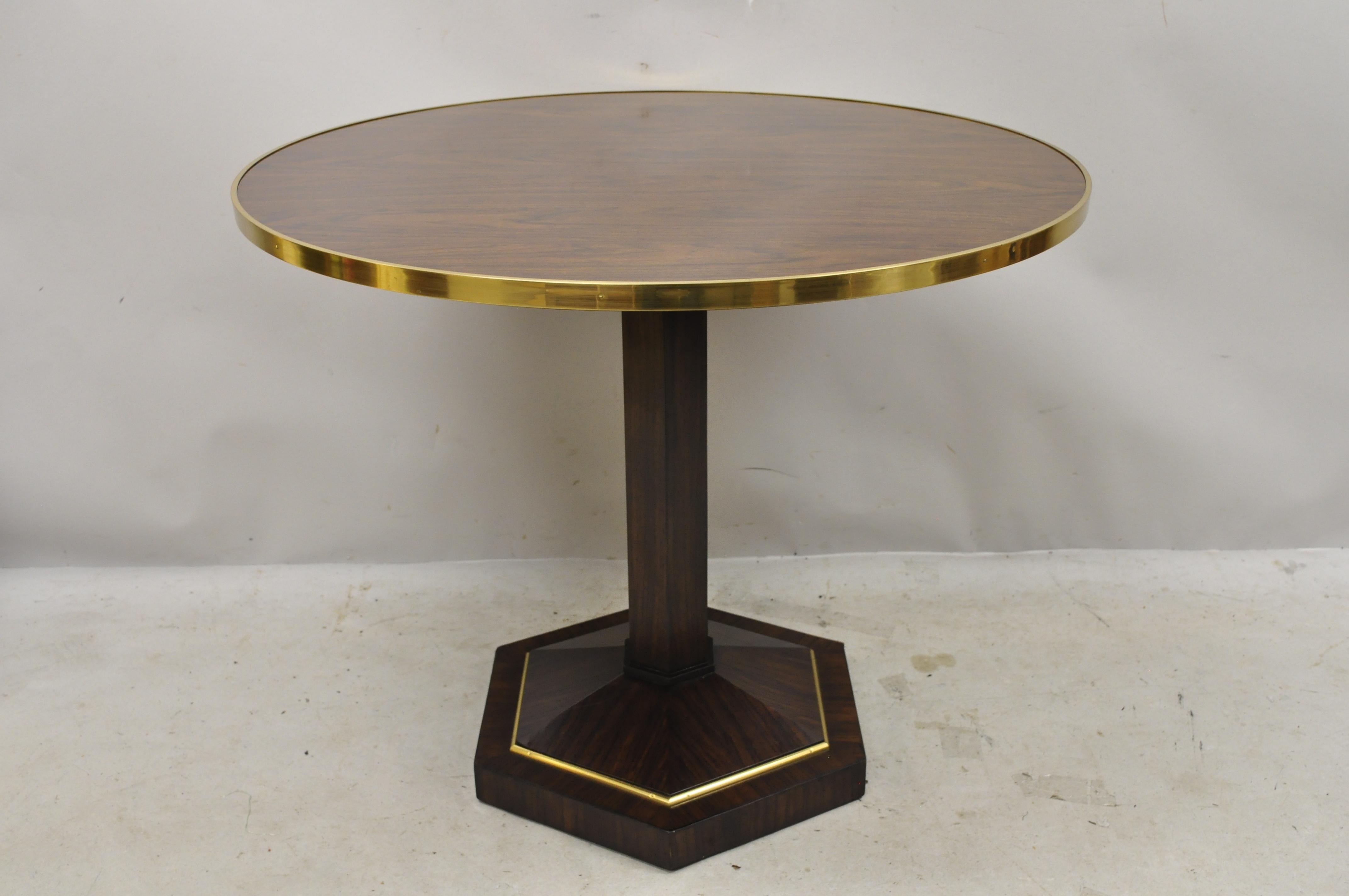 Maitland Smith French Empire zebra wood bronze band round pedestal base table. Item features bronze base/rim, pedestal base, beautiful wood grain, original label, quality craftsmanship, great style and form, circa late 20th century.
Measurements: