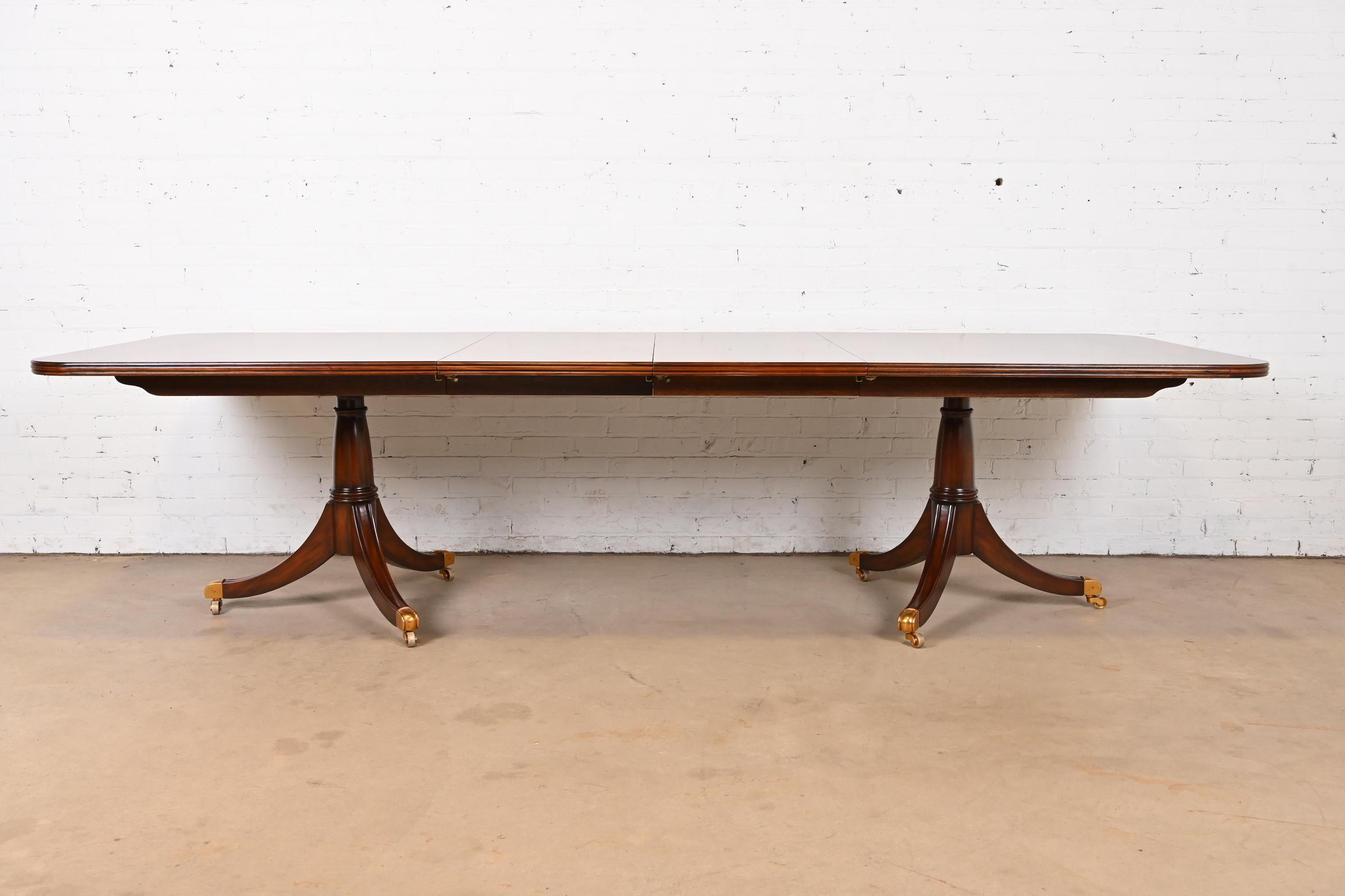 Maitland Smith Georgian Flame Mahogany Double Pedestal Extension Dining Table In Good Condition In South Bend, IN
