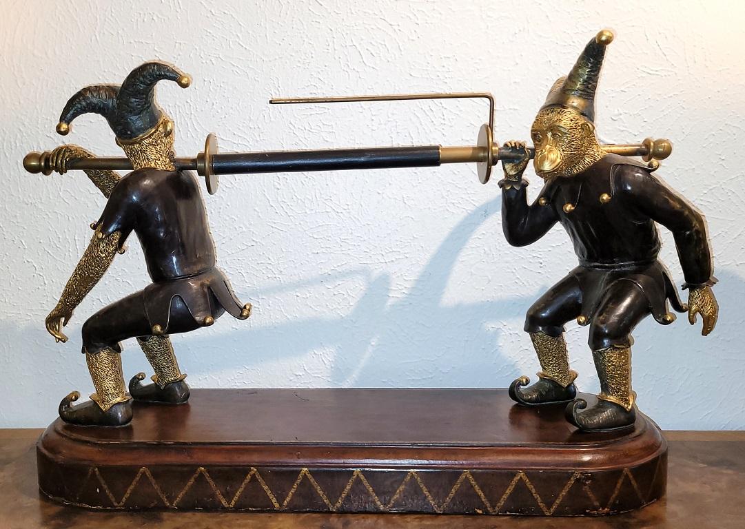 PRESENTING A GLORIOUSLY QUIRKEY AND WHIMSICAL Maitland Smith Gilt Bronze Monkey Paper Towel Holder.

Made by the well known maker, Maitland Smith, circa 1980.

This large piece is heavy, functional, decorative and downright AMUSING !

The pair