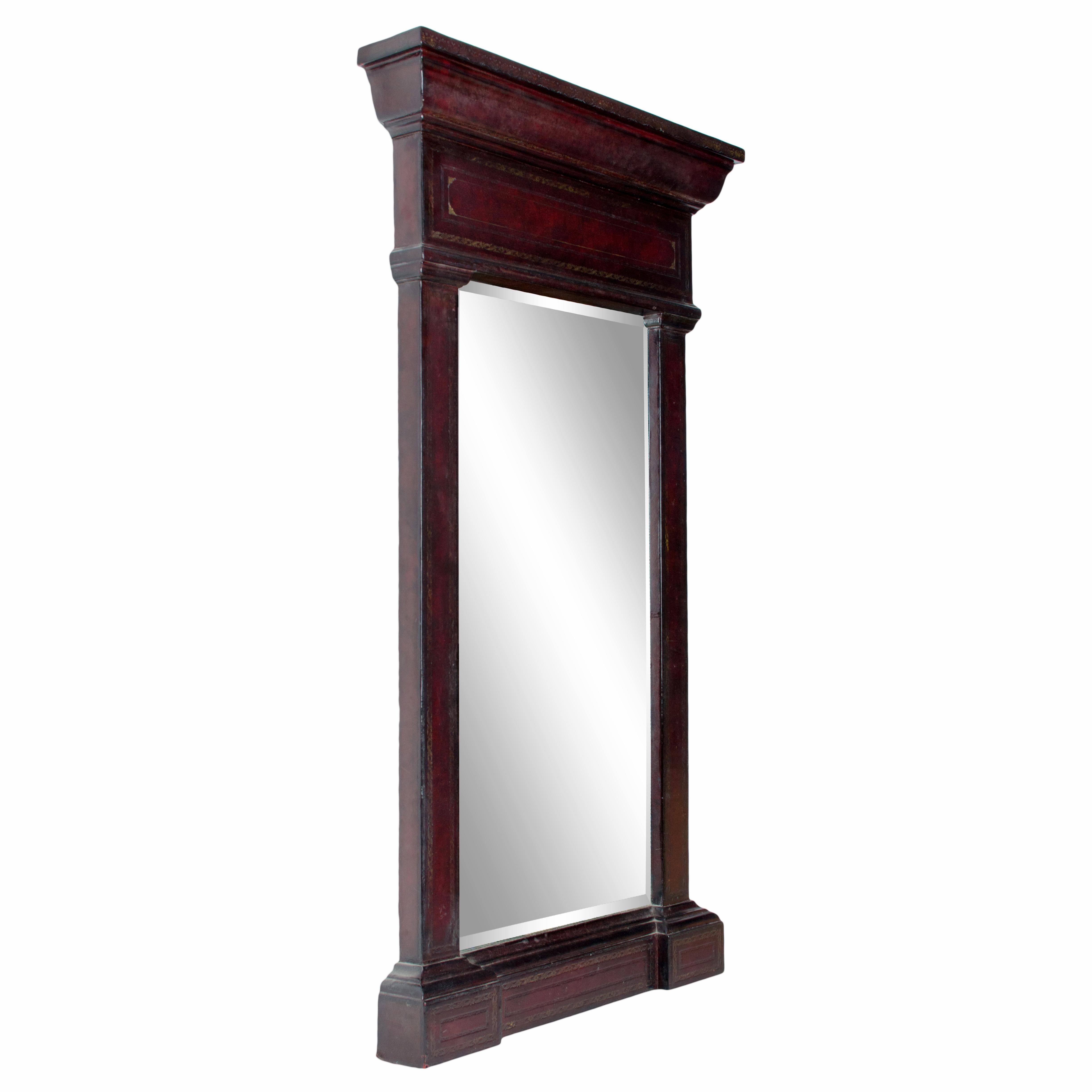 A Maitland-Smith gilt embossed leather mirror.

A one-of-a-kind finely crafted, very heavy piece.



26 ½ inches wide by 4 ¼ inches deep by 46 ½ inches tall 