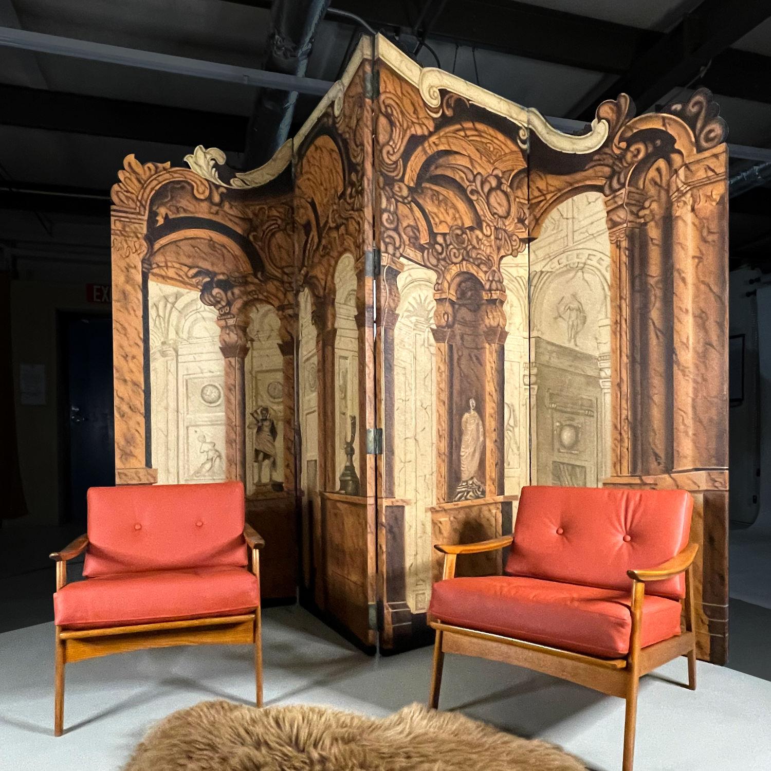 Opulent, large scale, Maitland Smith hand-painted room divider folding screen. The Greco-Roman themed folding screen features neoclassical architecture and sculpture as decadent as the halls of the Roman Senate. Each of the four panels measures 34″