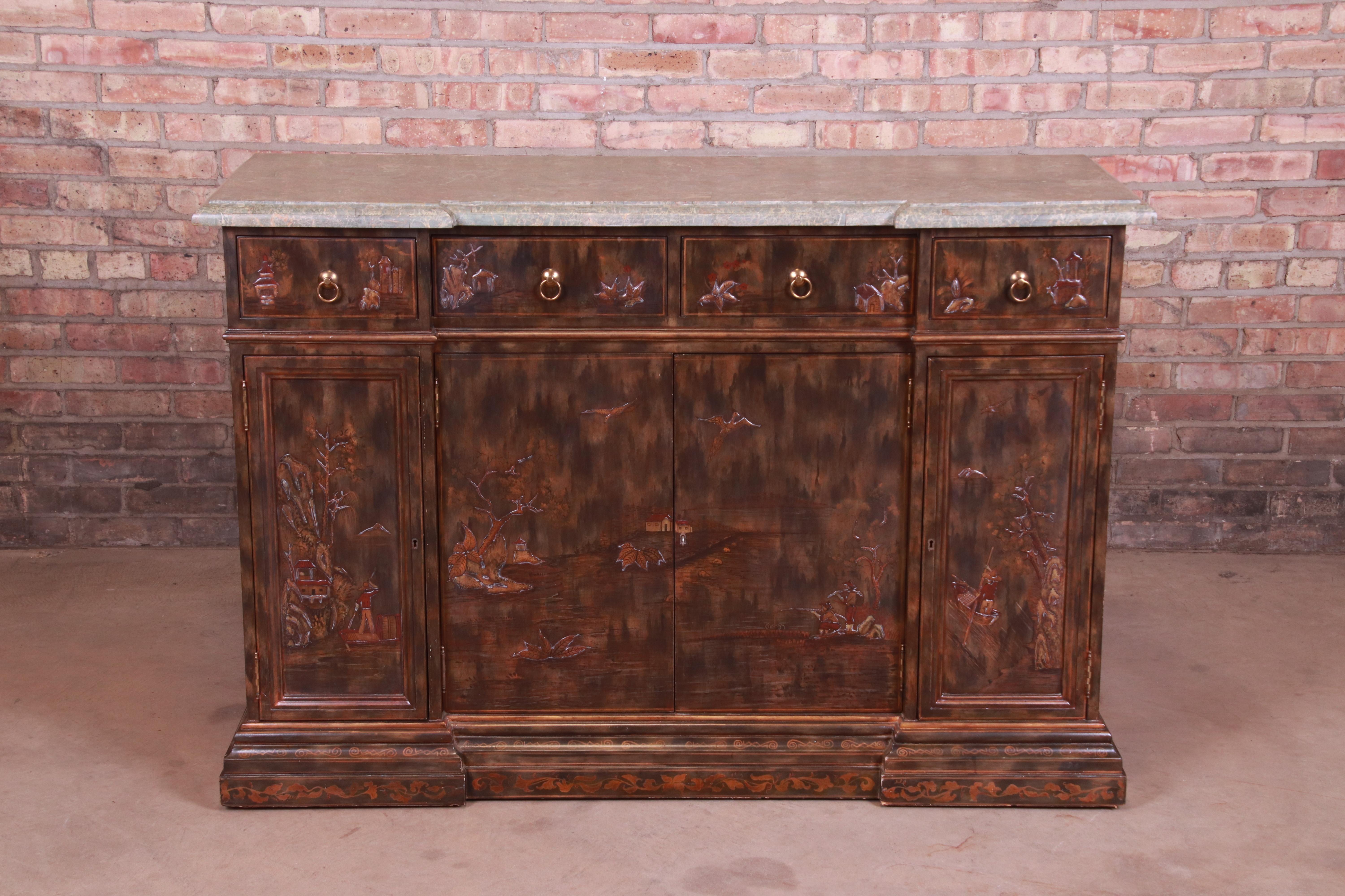 A gorgeous Hollywood Regency chinoiserie sideboard, credenza, or bar cabinet

By Maitland Smith

USA, late 20th century

Painted wood case with Asian nature scenes, beveled marble top, and original brass hardware.

Measures: 55