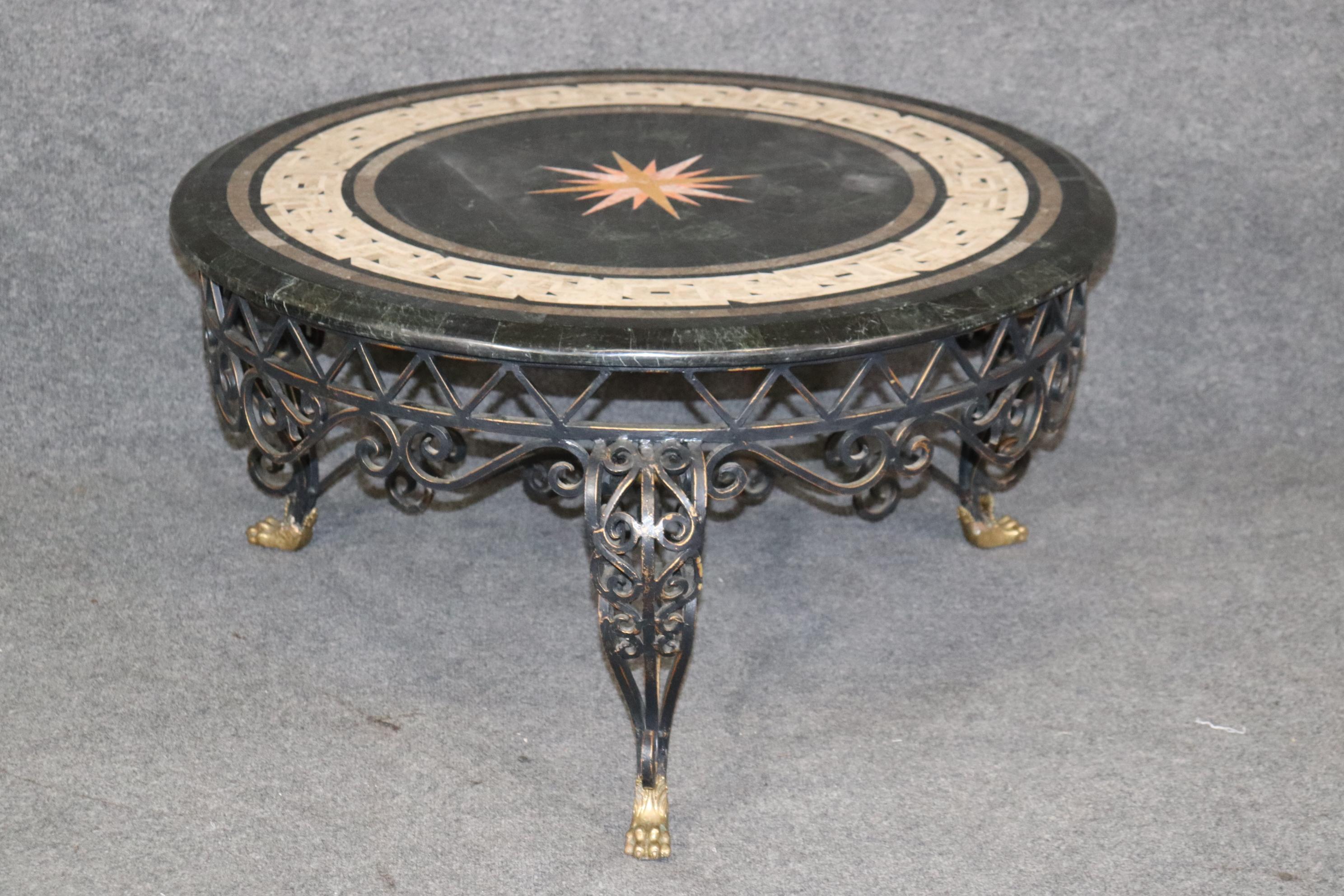 Dimensions- H: 19 1/4in W: 37 1/2in D: 37 1/2in 

This vintage Maitland Smith Style tessellated marble top iron coffee table is made of the highest quality and is perfect for you and your home! For over four decades, Maitland-Smith has been creating