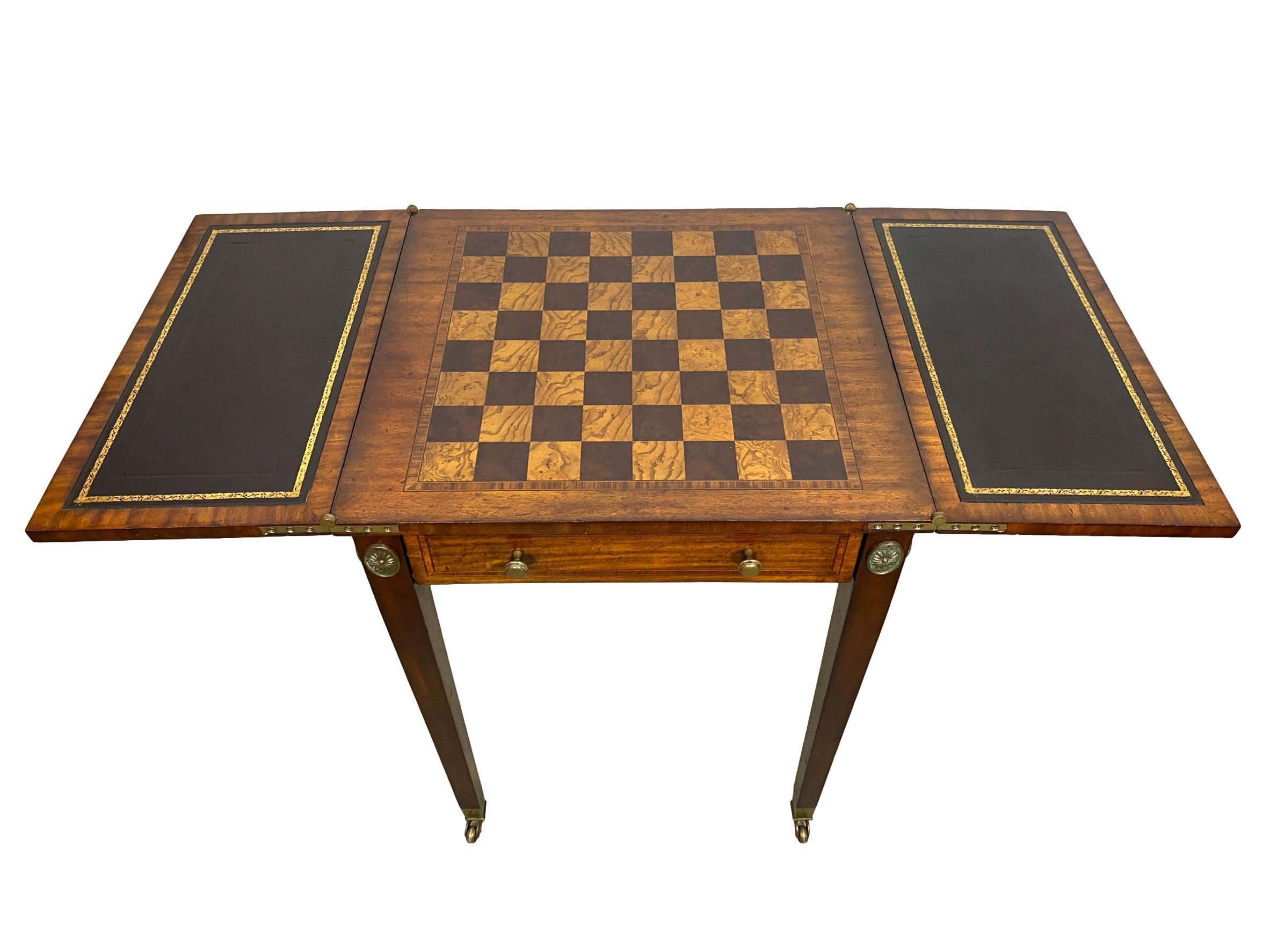 Maitland-Smith. Inlaid with exotic woods and marquetry Convertable chess game table board with brass mounts. With maker's brass plaque: 'Maitland-Smith'. Comes with original and complete chess and checker set.