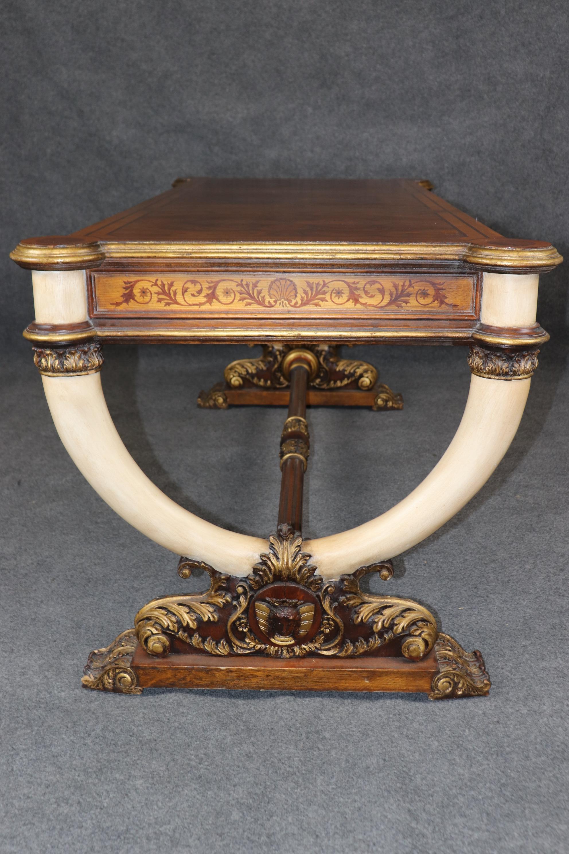 This is a gorgeous Maitland Smith attributed burled walnut writing desk or bureau plat with ivory painted 