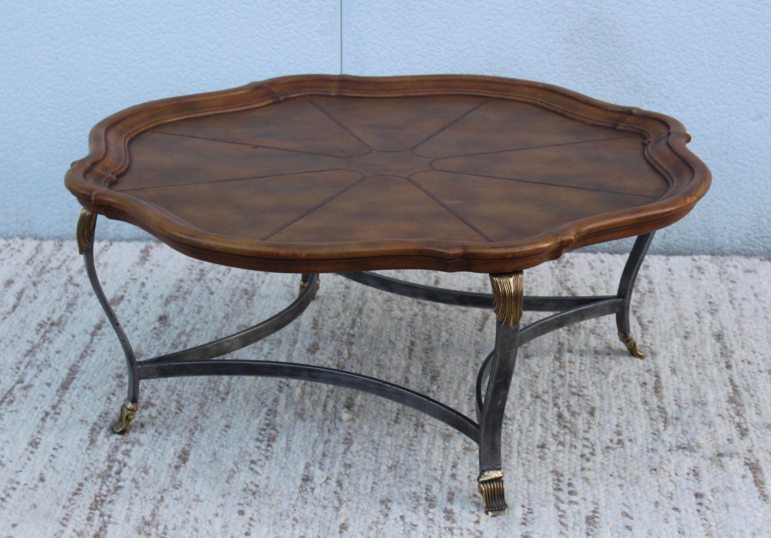 Stunning 1980s leather top coffee table by Maitland-Smith, with iron and brass detail base.