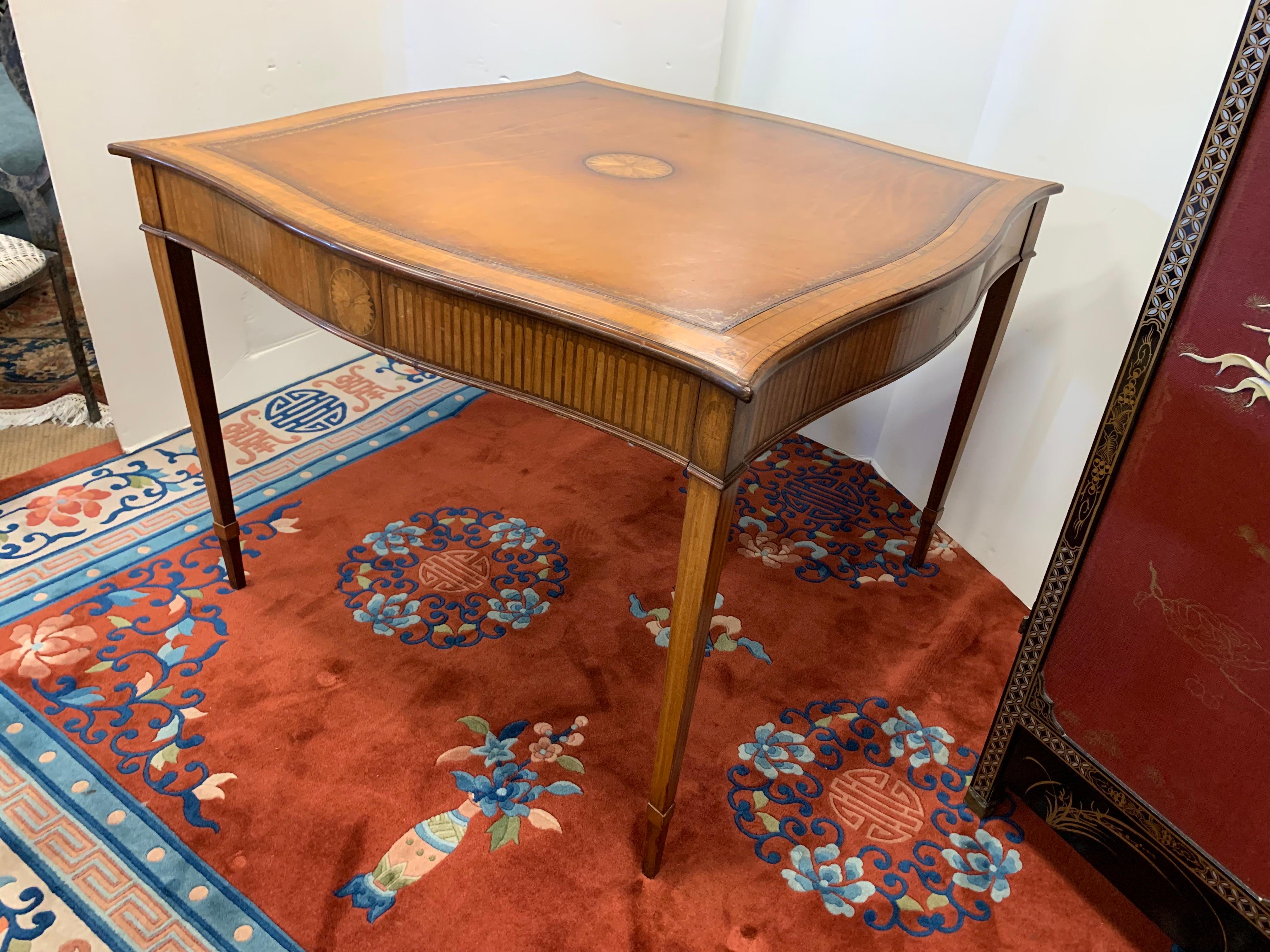 Elegant Maitland Smith leather top mahogany game table. Great scale and better lines. Now more than ever, home is where the heart is.