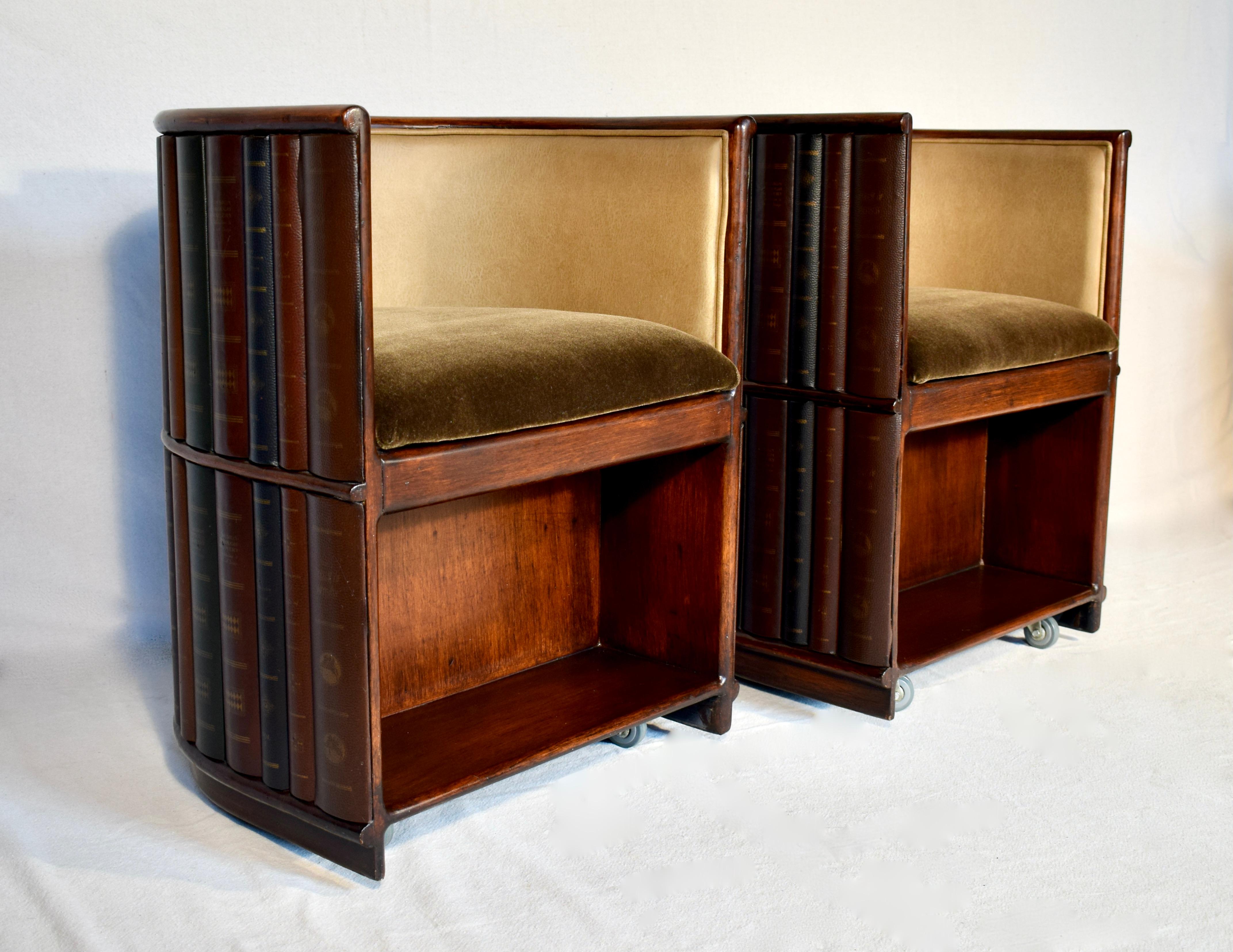 A pair of small scale Maitland Smith leather books library barrel chairs on casters with newly upholstered Mohair seats, faux leather inside back surrounds & interesting lower shelf detail. From a standing position the chairs appear to be floating.