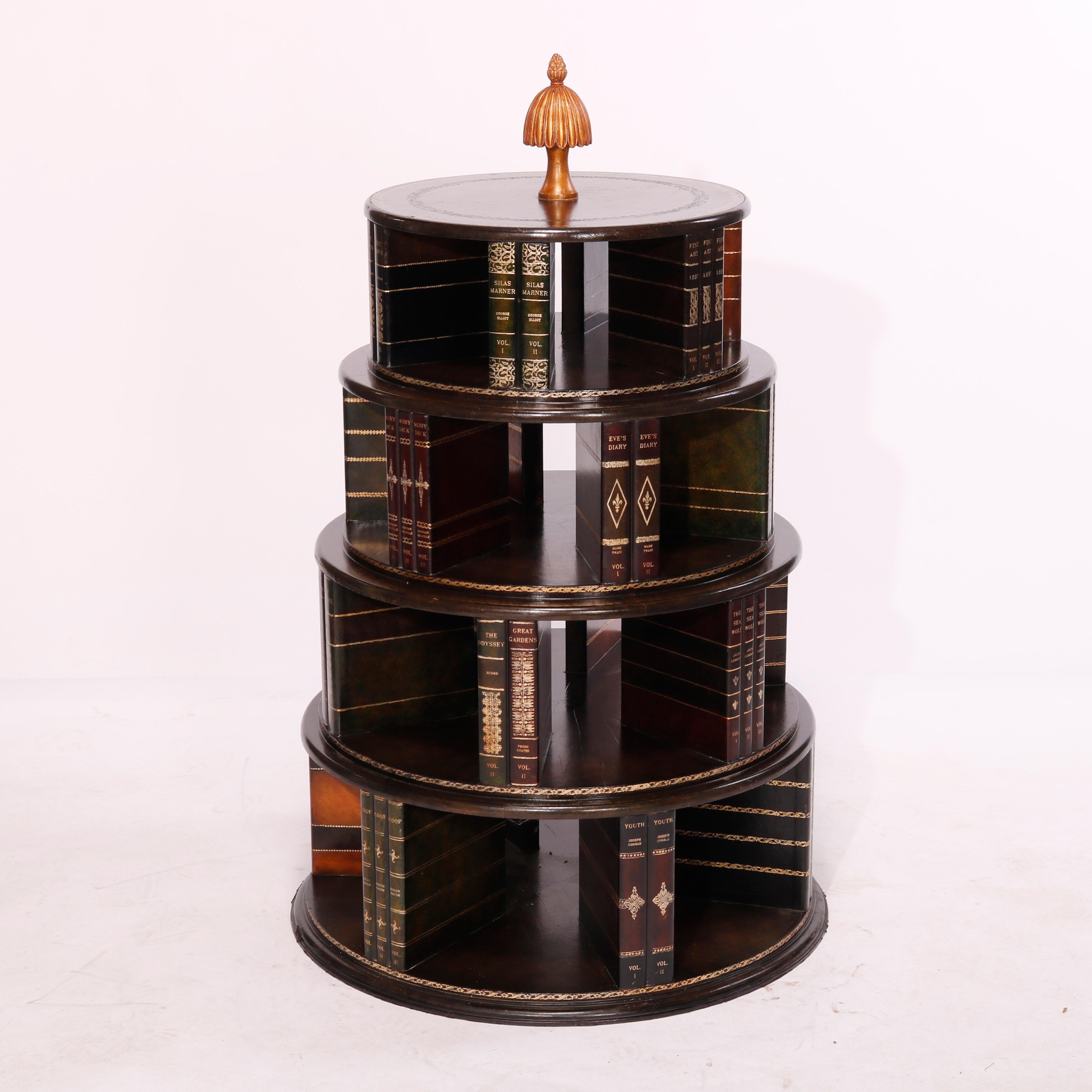 A revolving bookcase by Maitland Smith offers mahogany construction in tiered form and having faux books with tooled and gilt leather facing, 20th century

Measures - 47.5'' H x 27.5'' W x 27.5'' D.

Catalogue Note: Ask about DISCOUNTED DELIVERY