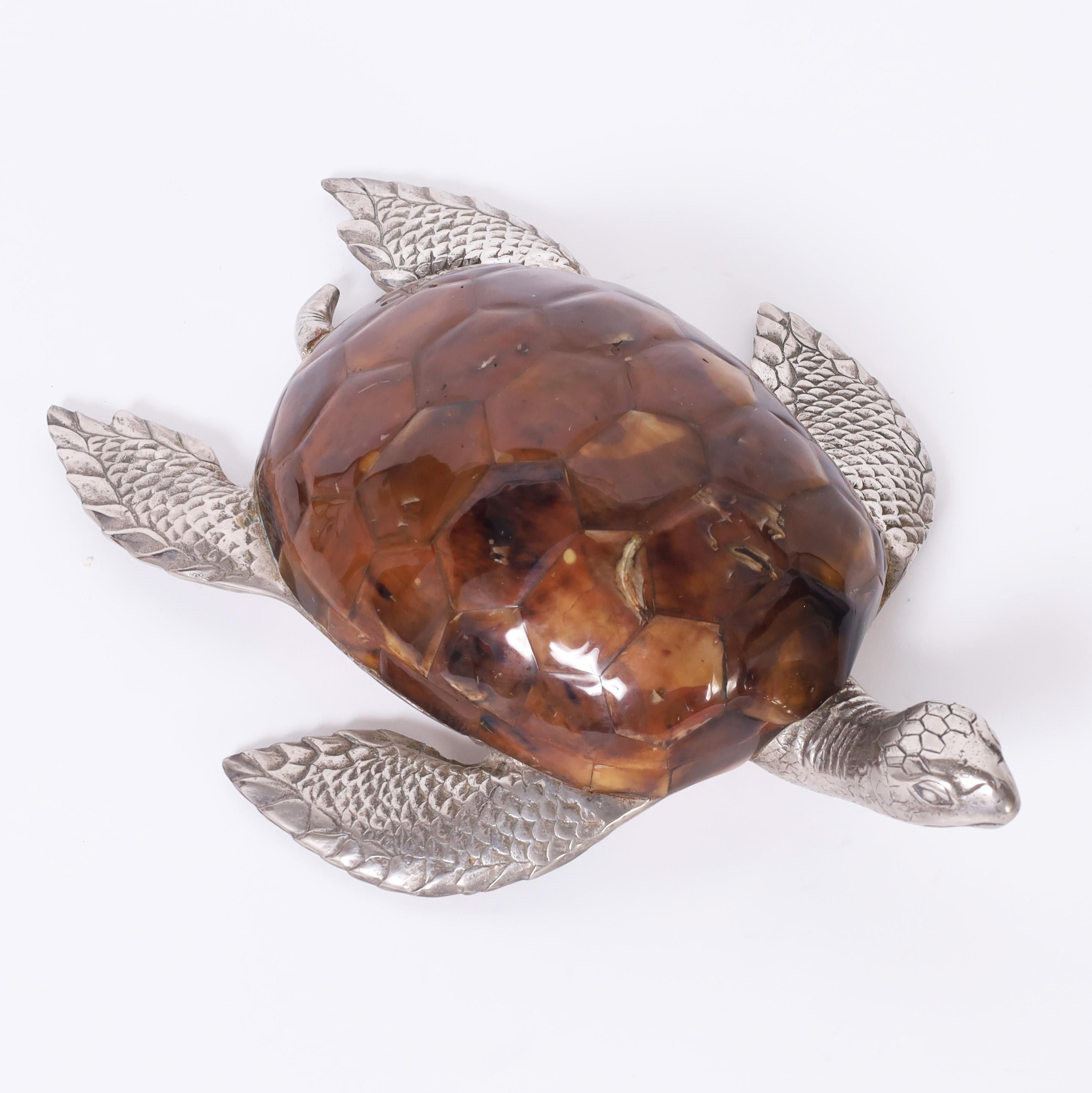 Charming vintage turtle sculpture or object of art handcrafted in silver plate over bronze with a faux tortoise shell. Signed Maitland -Smith on the bottom.