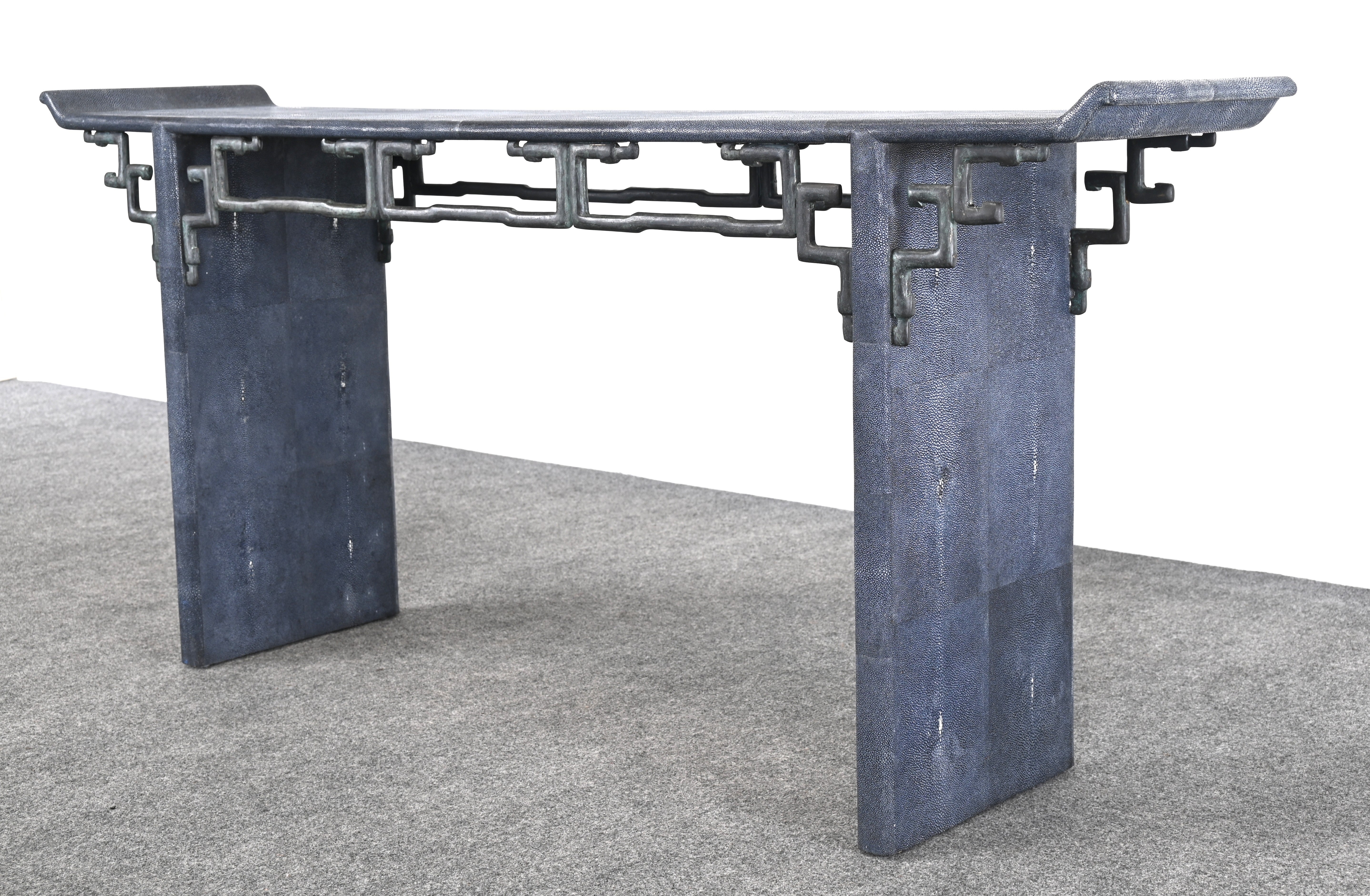 A handsome blue-grey faux shagreen and verdigris bronze finish Asian-style altar table or console table made by Maitland Smith. Shagreen is an untanned leather that is dyed in the manner of the rough skin used from sharks and sting rays. This
