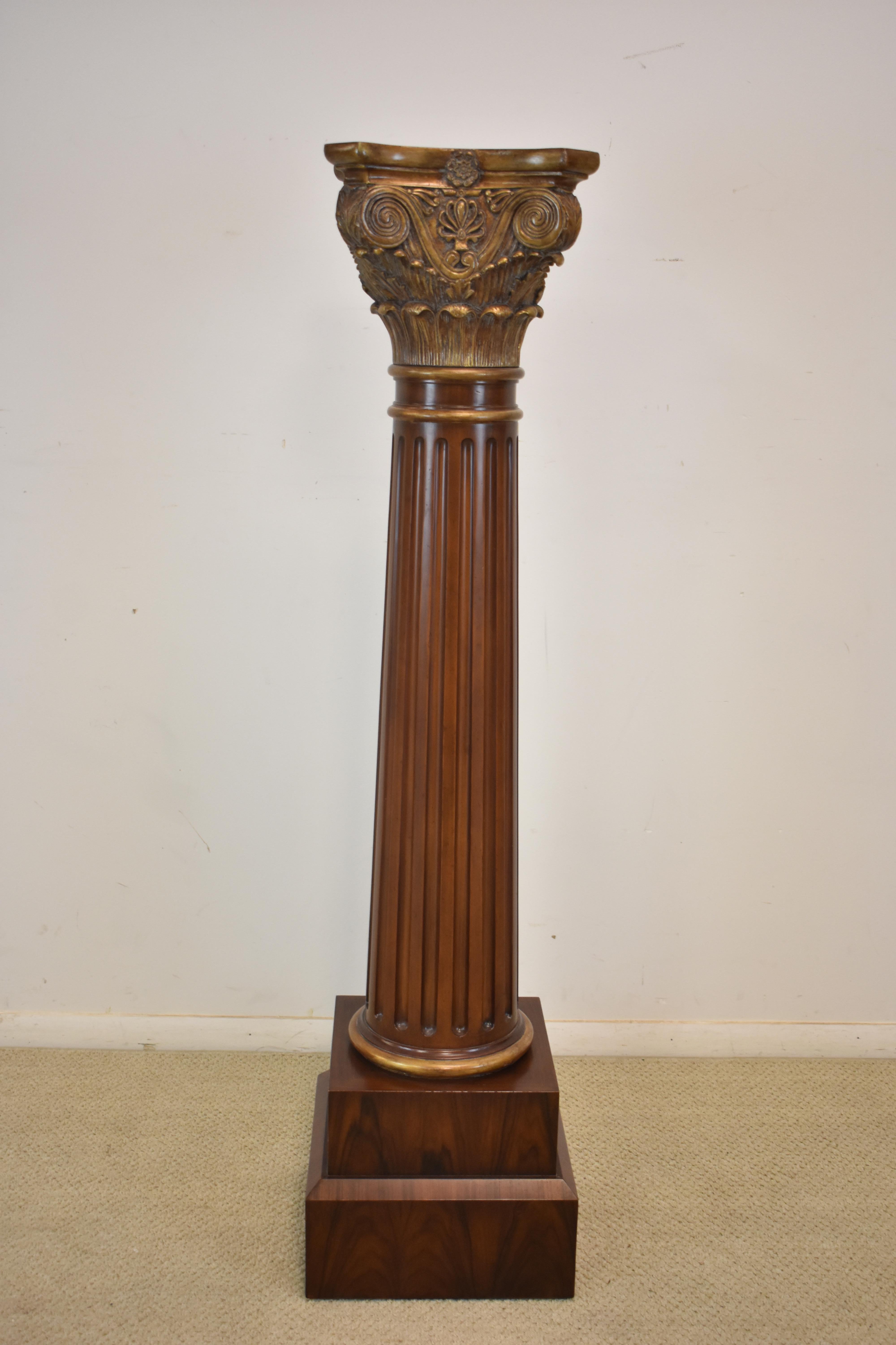Hand-carved burled rosewood with gold gilt detail fluted column by Maitland Smith. Scroll, shell and floral details with a staggered base, Burled Rosewood with Corinthian top, for plants, statue or display.