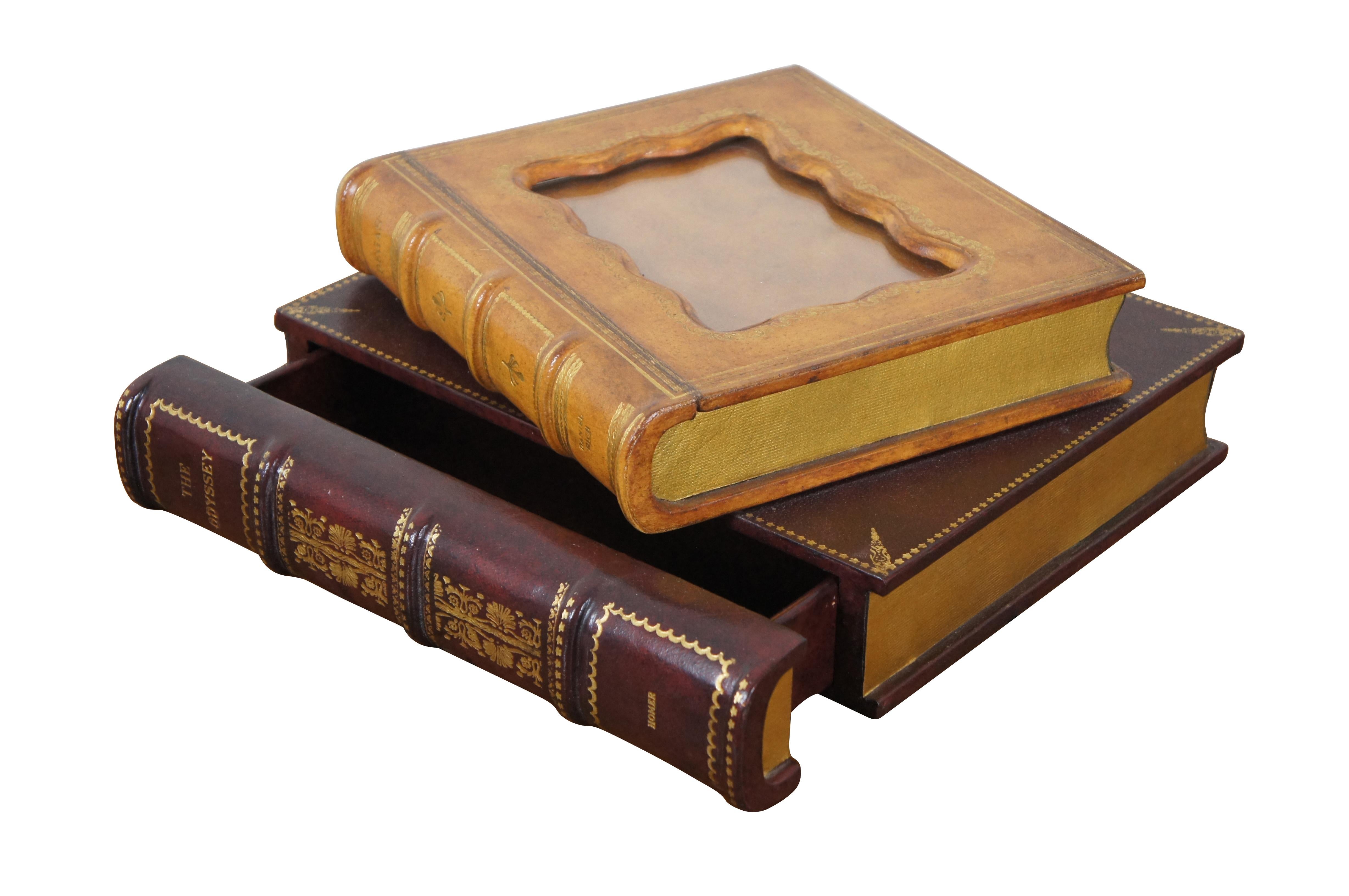 Vintage Maitland Smith trinket / keepsake / jewelry box / casket in the shape of two stacked leather bound books (Degas and The Odyssey) with gilded pages. The top one flips open and is set with a scalloped edge picture frame. The spine of the