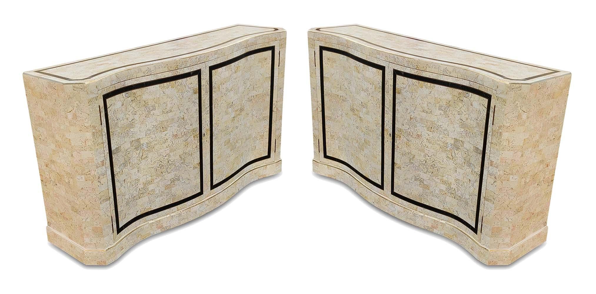 Maitland-Smith tessellated stone and brass two-door cabinets with scroll design in the Hollywood Regency style. Each cabinet features an interior lined with mahogany and one removable mahogany shelf. Locking keys present. Foil label on back, brass