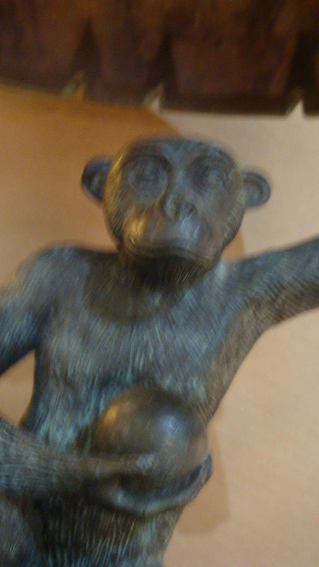 This is a penshell monkey lamp made by Maitland-Smith probably from 1970s.