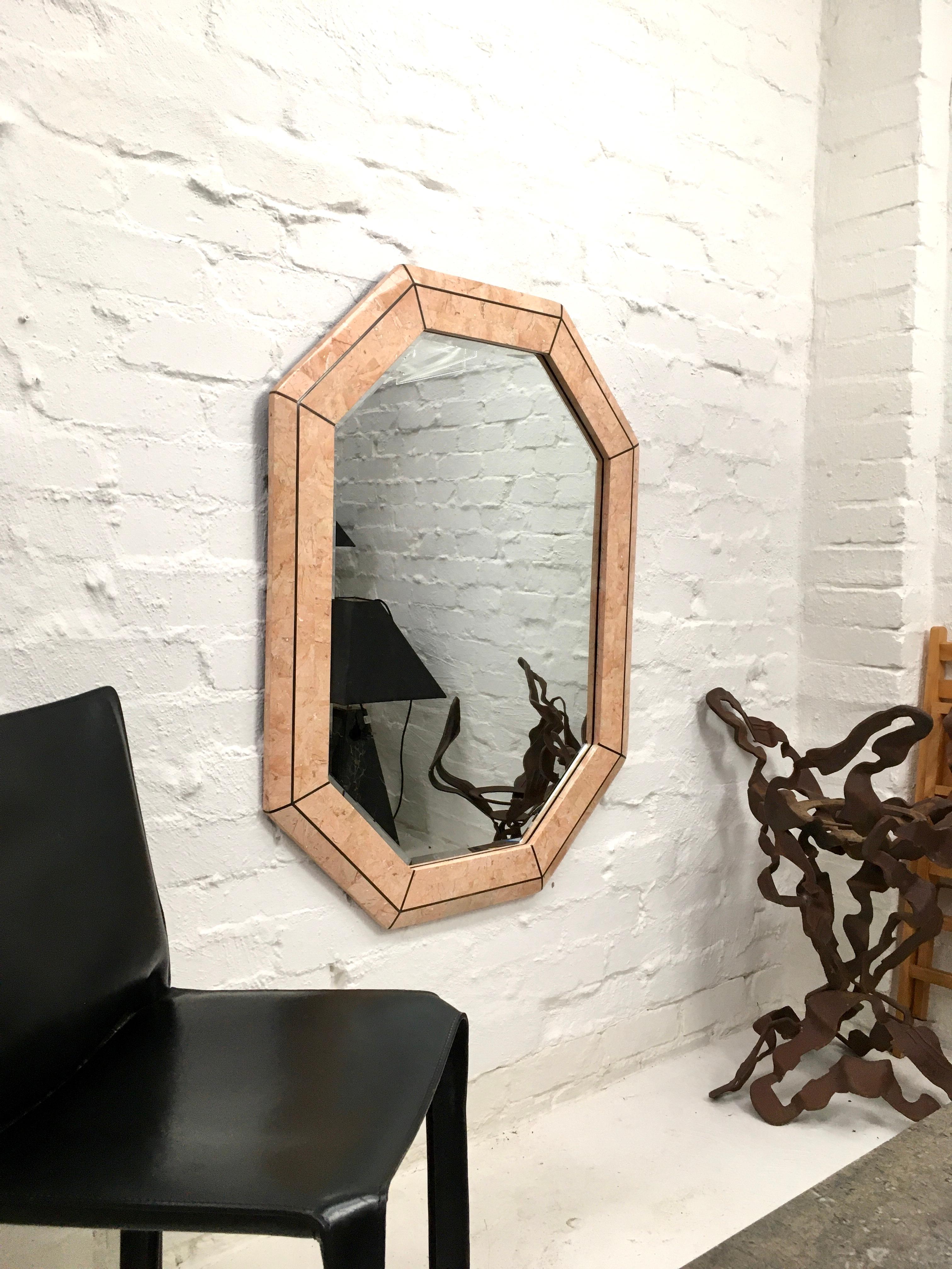 We love the work of Maitland-Smith. It’s always a pleasure to handle these pieces. They’re so beautifully made, substantial, stylish and handsome. This mirror is typical of their work. 

A large octagonal bevelled mirror with wide, tessellated