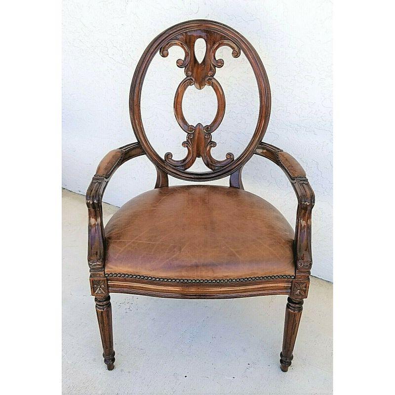 Maitland Smith Sheraton style scroll back leather seat desk chair armchair

Featuring a spring-supported genuine leather seat with a subtle scroll design to match the scroll back and is trimmed in french brass nails, and leather