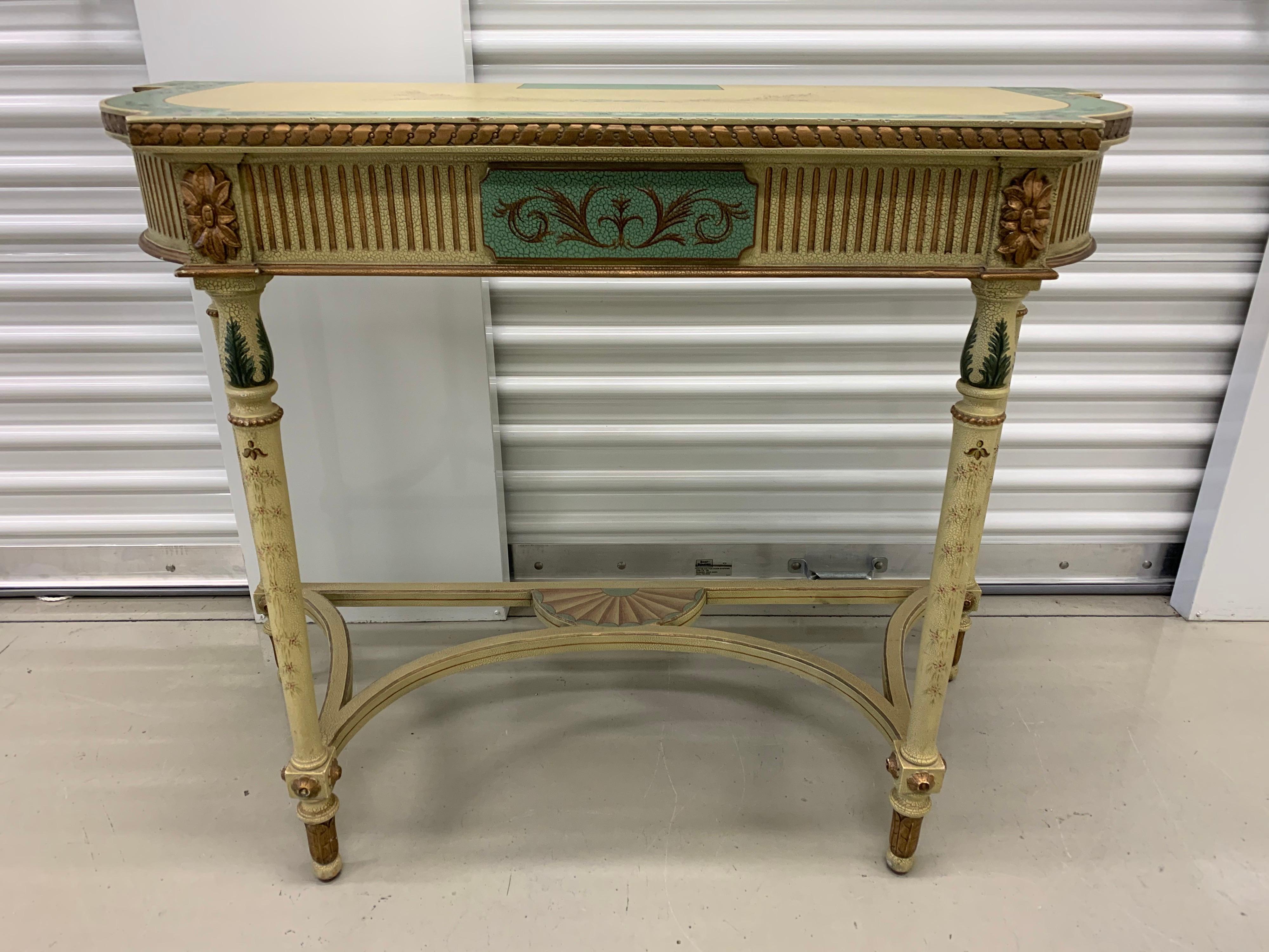 Signed Maitland Smith hand painted console table with lovely color scheme. Multipurpose, can be used
as console, foyer table or bar.