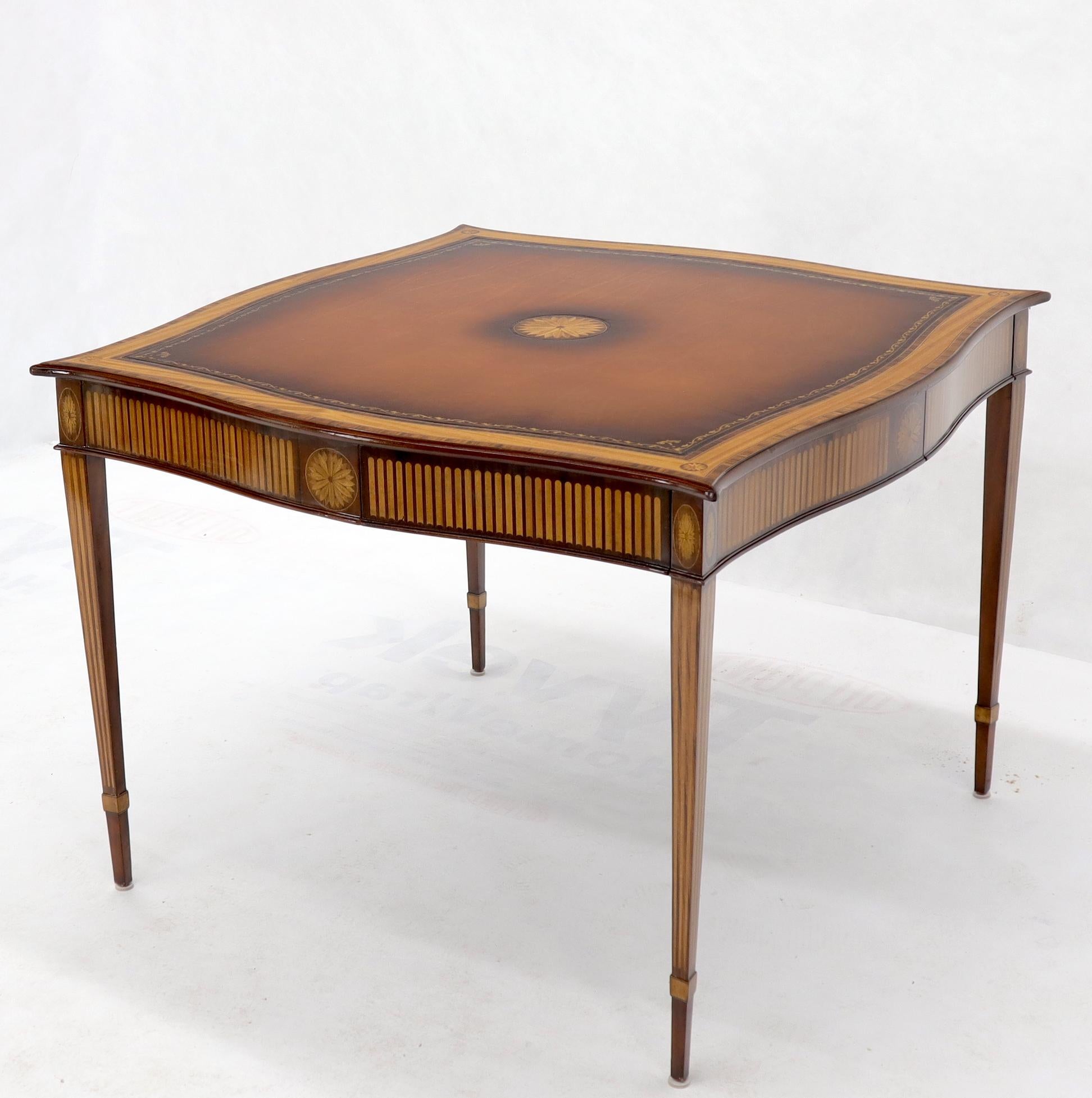 Mahogany and leather top inlay game writing table desk with tapered legs and 4 drawers.