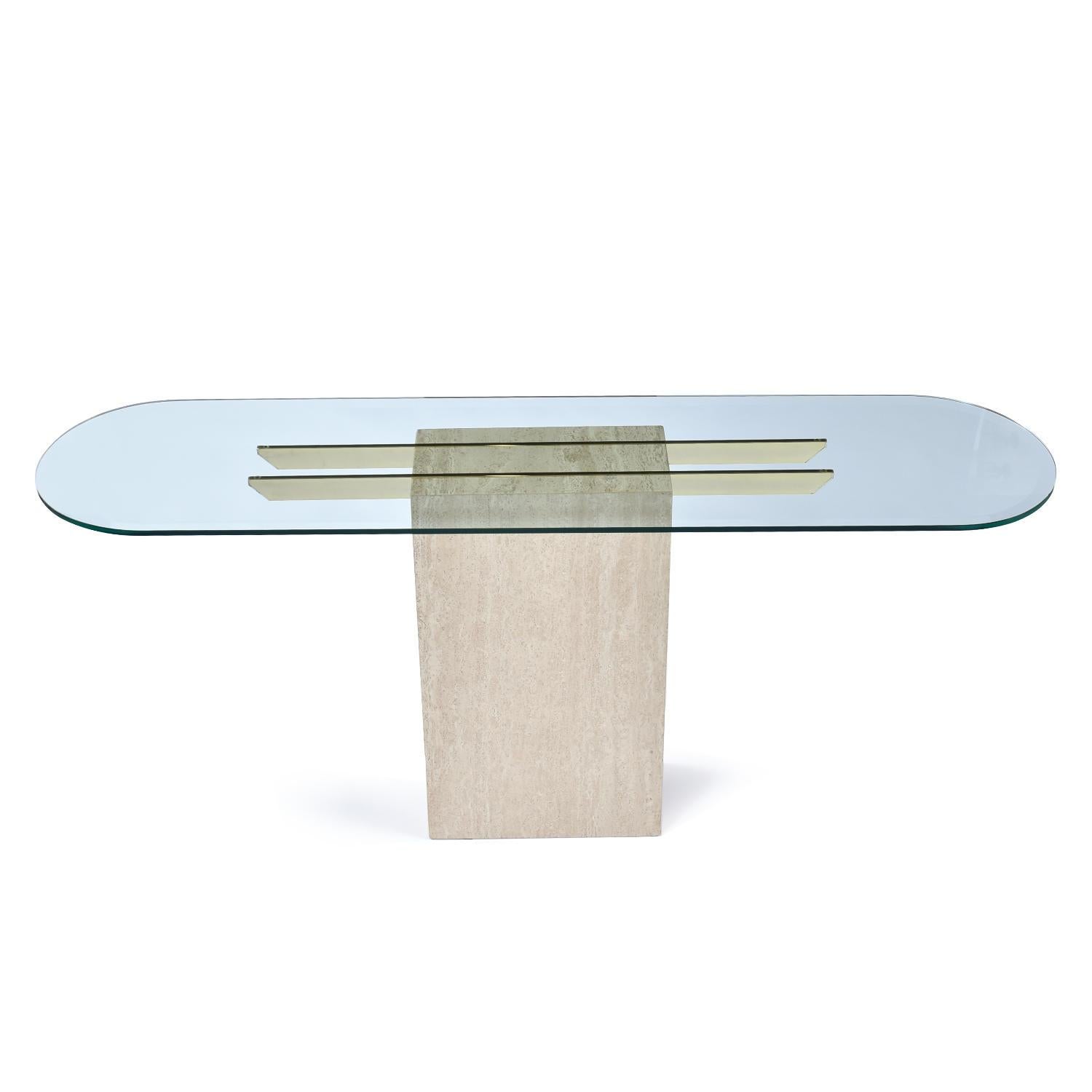 Stunning travertine stone square pedestal cocktail table in the style of Maitland-Smith. Super-sleek, elegant and Classic modern style. The stone has exotically marbled earth tone veins. The Minimalist design is perfectly complimented and contrasted